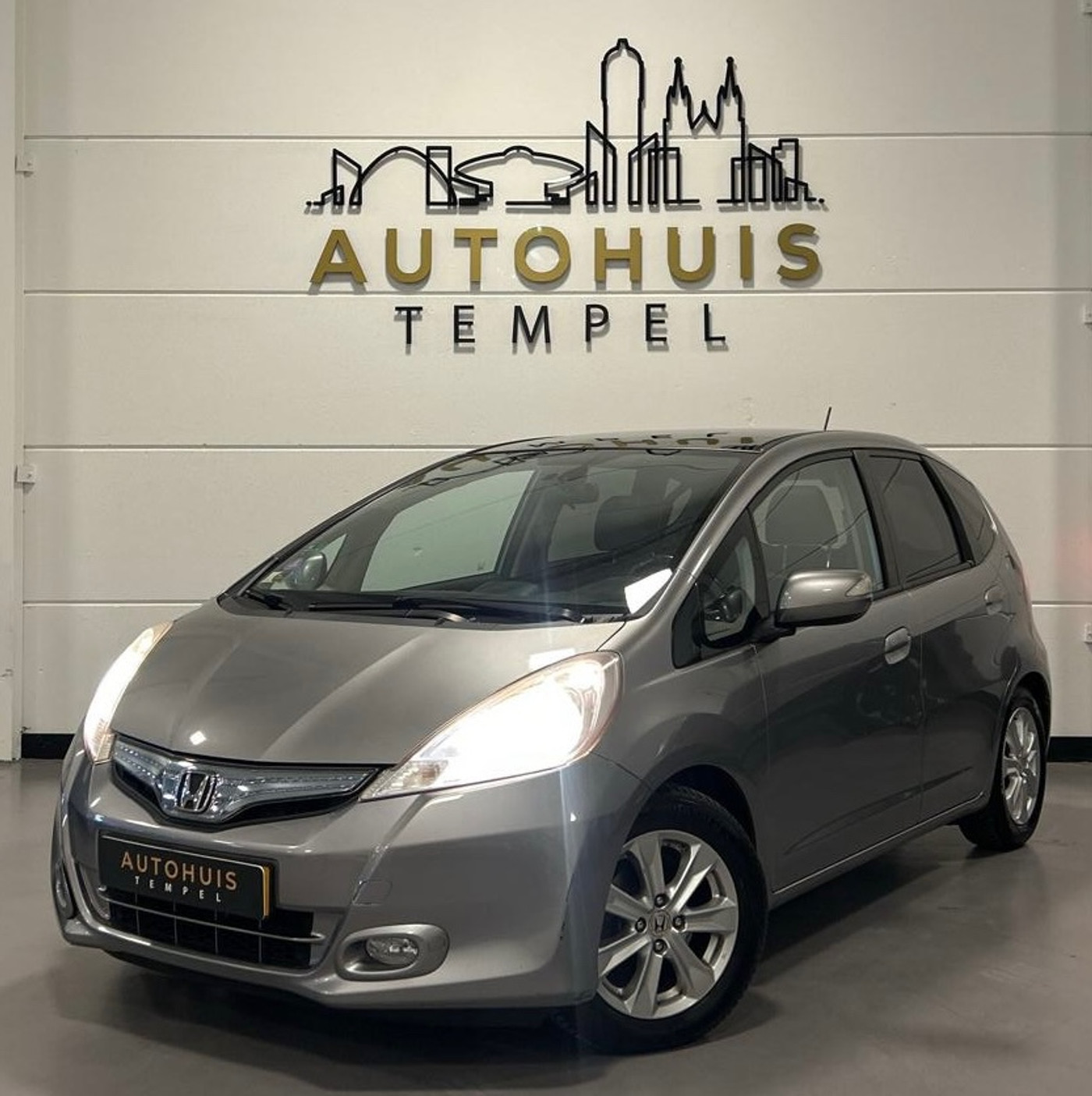Honda Jazz Hybrid 1.4 Hybrid Exclusive Automaat Nap 1E Eigenaar Dealer Onderhouden Cruise Climate Leder Stoelverwarming 2011 - voorkant