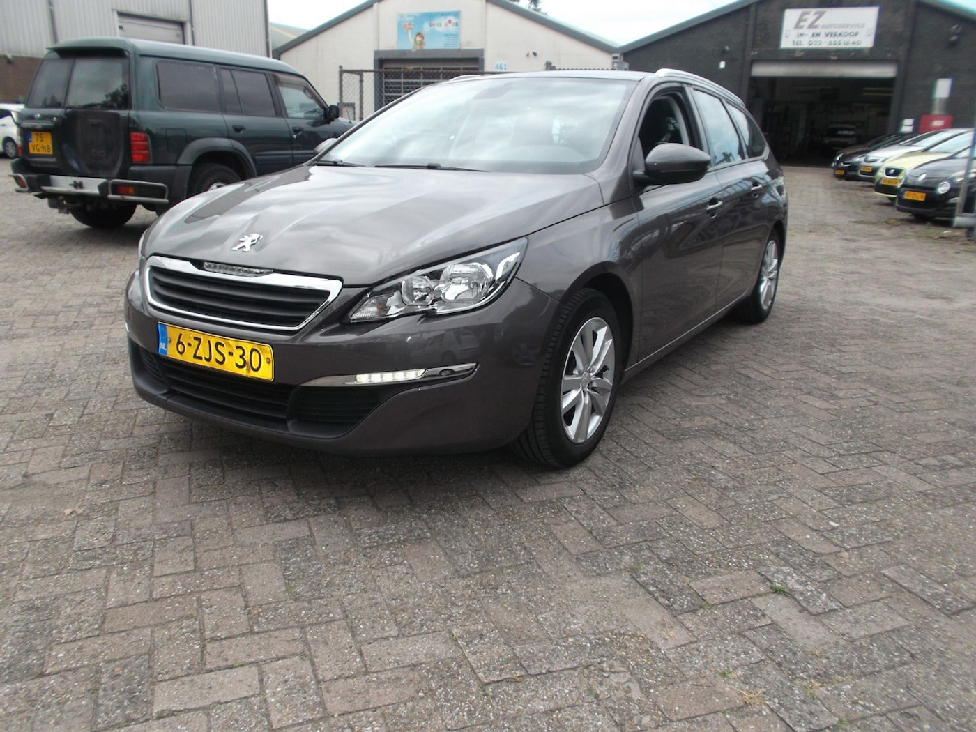 Peugeot 308 SW 1.2 e-THP Allure 2015 - voorkant