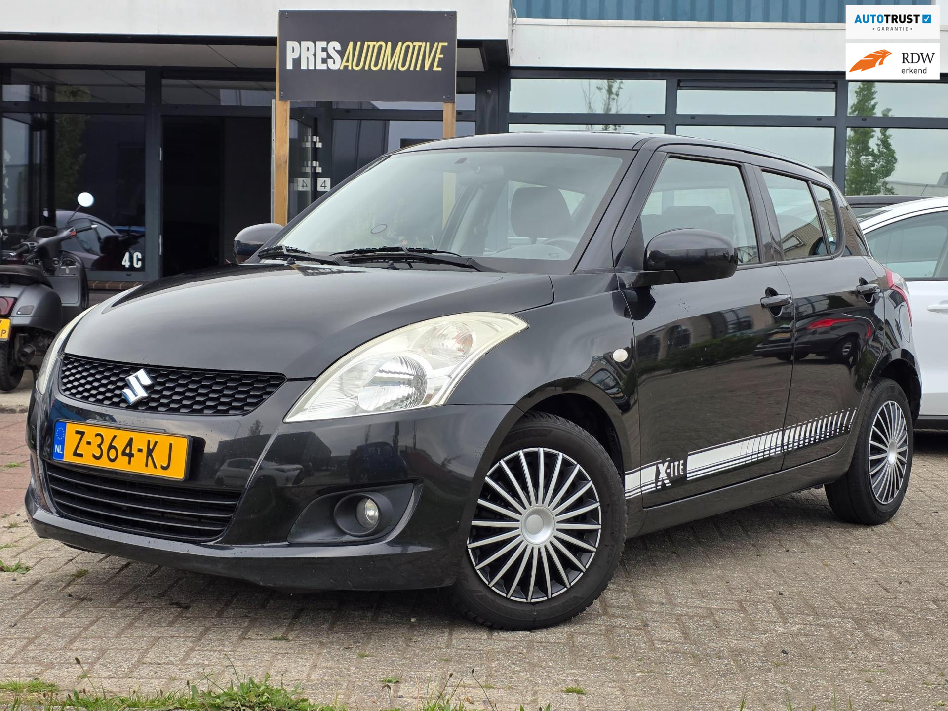Suzuki Swift 1.2 Comfort EASSS |PANO|CLIMA|CRUISE|KEYLESS 2011 - voorkant