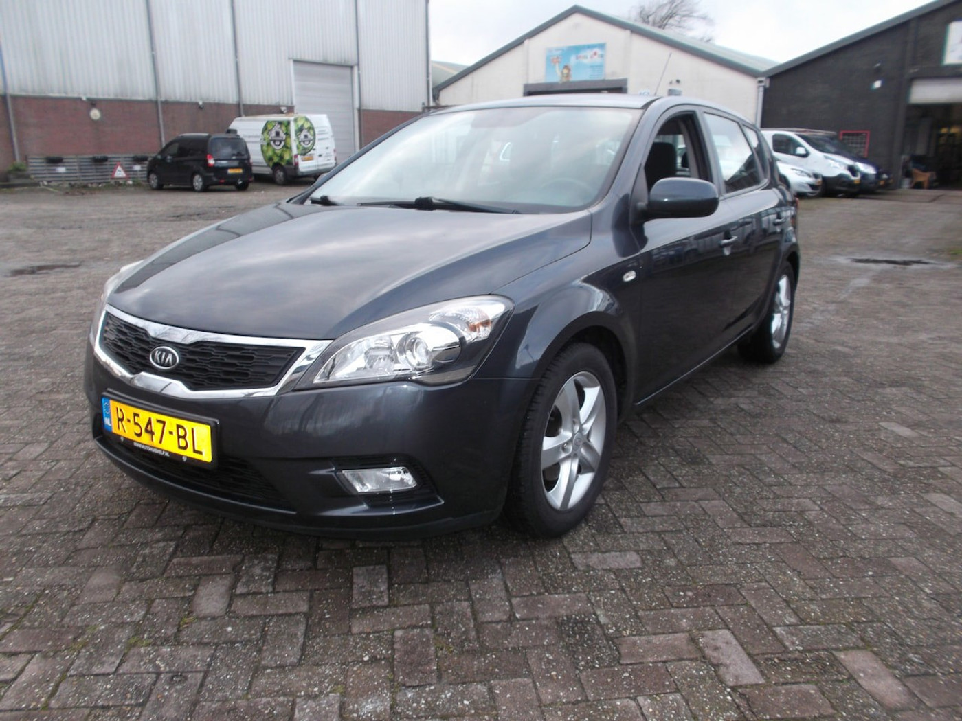 Kia Cee D 1.4 CVVT X-pect 2012 - voorkant