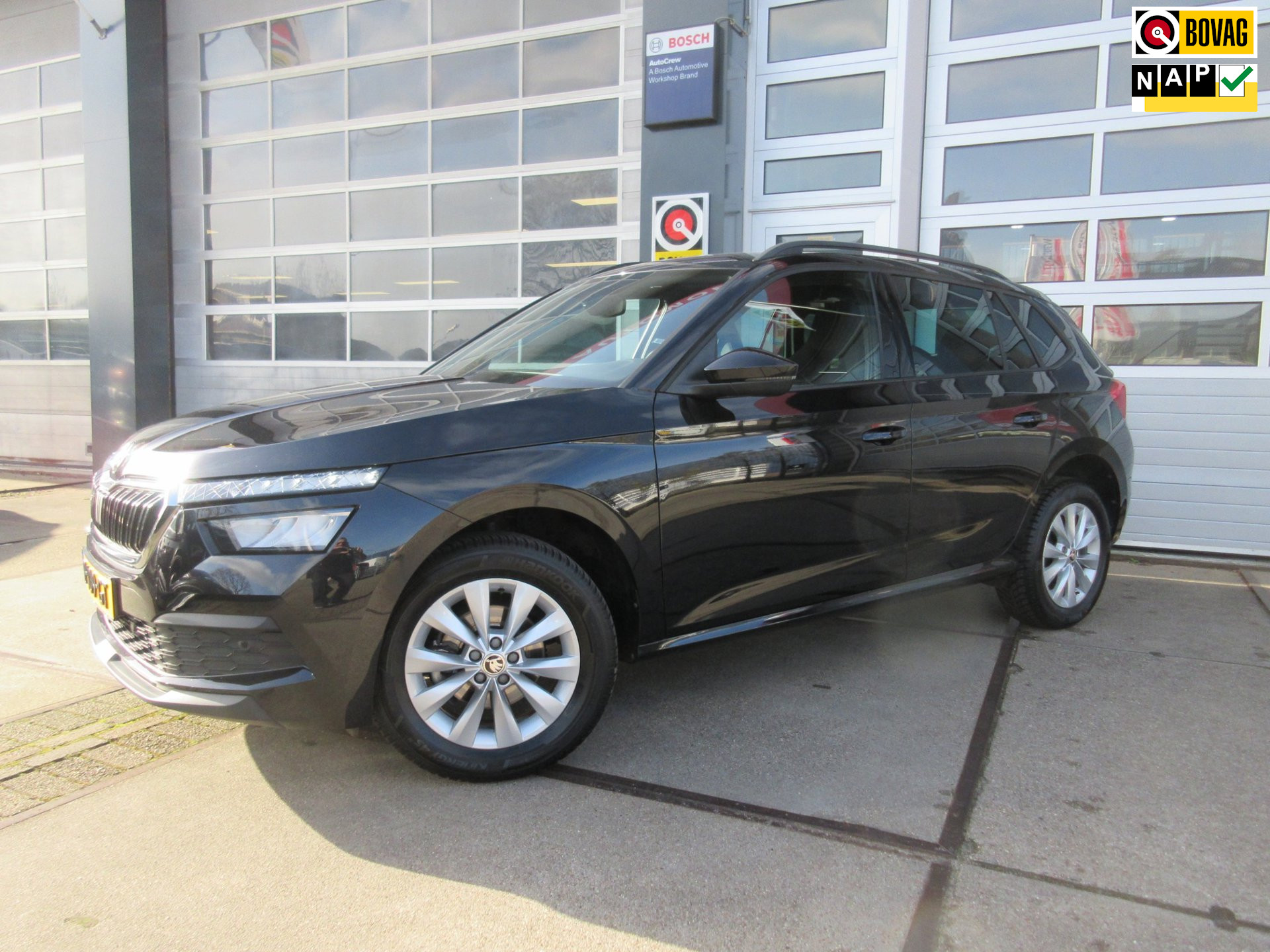 Skoda Kamiq 1.0 TSI Sport Business 2022 - voorkant
