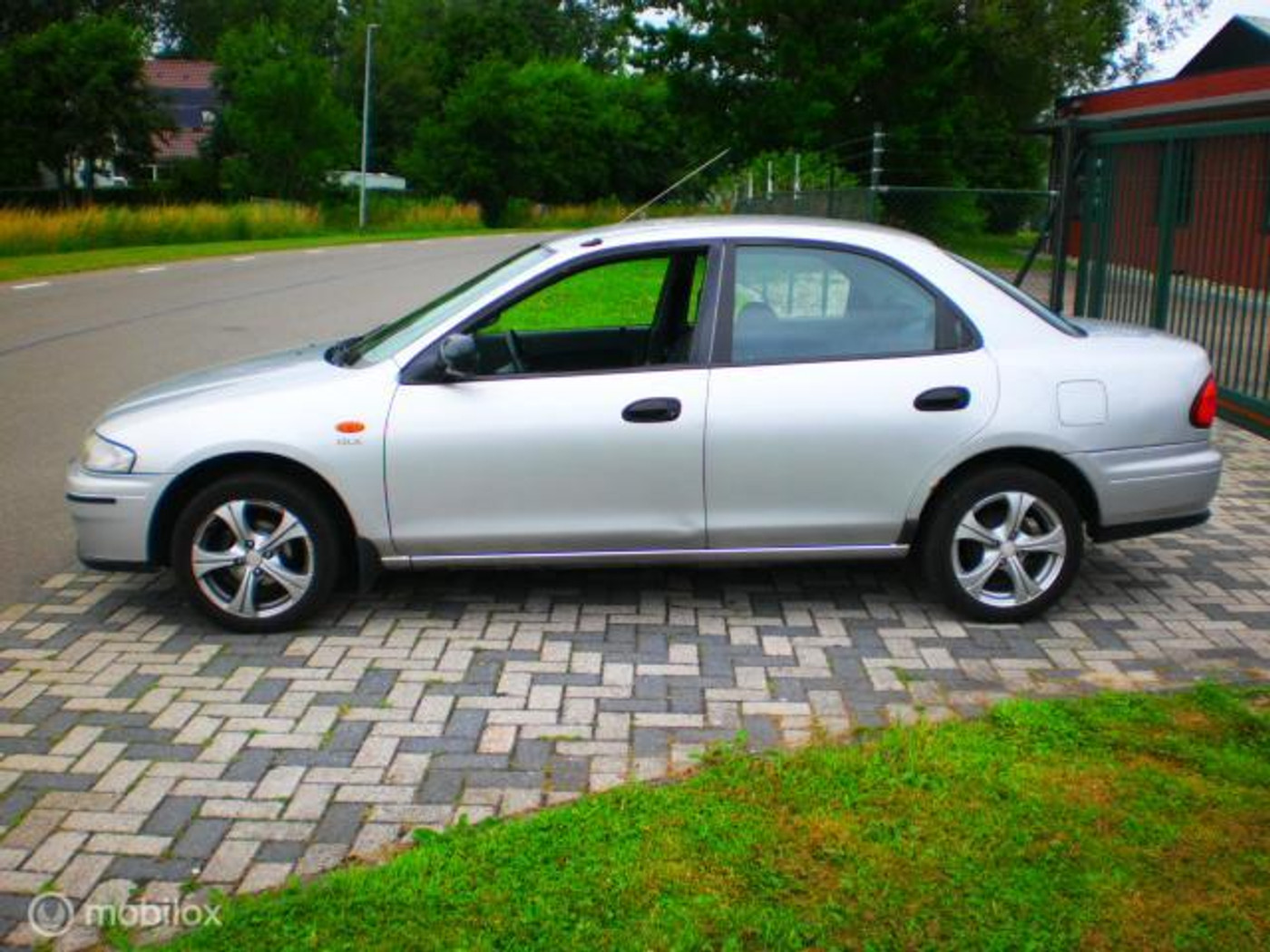 Foto van Mazda 323