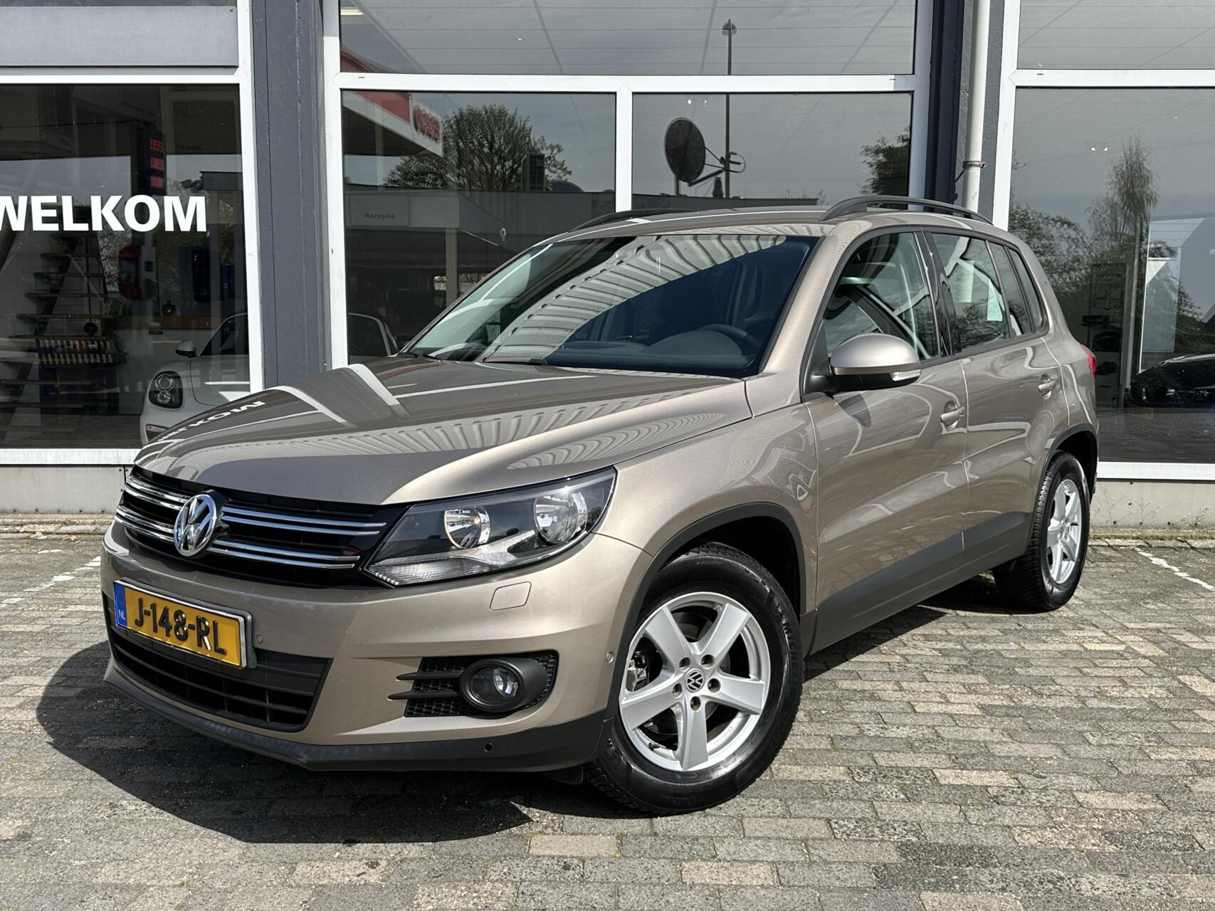 Volkswagen Tiguan 1.4 TSI Sport&Style|PDC|Trekhaak|Rijklaar 2015 - voorkant