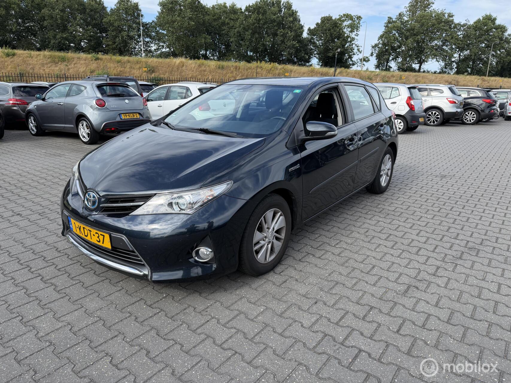 Toyota Toyota Auris 1.8 Hybrid Aspiration 2013 - voorkant