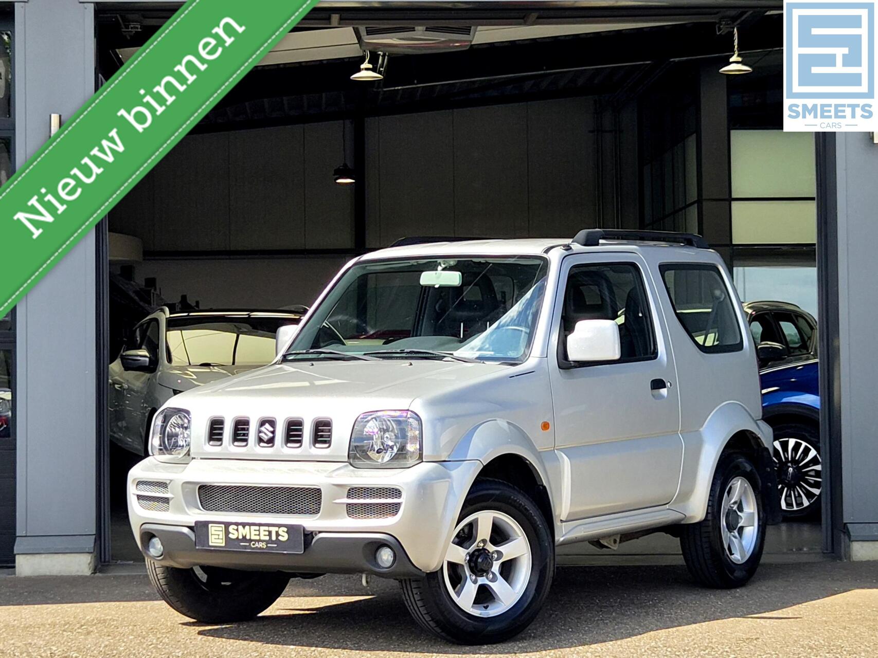Suzuki Jimny 1.3 4WD Exclusive 1e Eig! |Airco|El.Ra.|Leuk! 2012 - voorkant