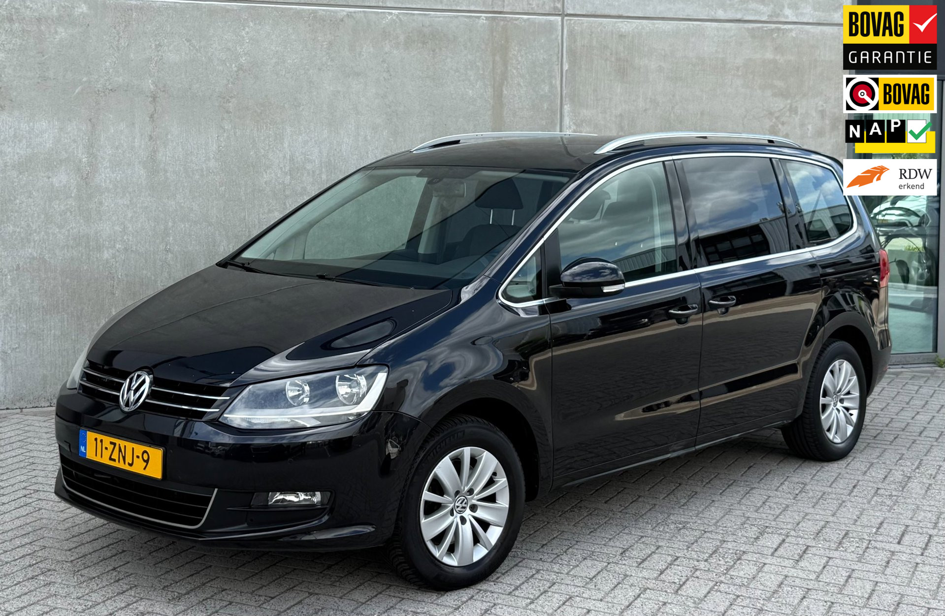Volkswagen Sharan 1.4 TSI HL 7p. 2013 Zwart NAVI|PDC|2E EIG 2013 - voorkant