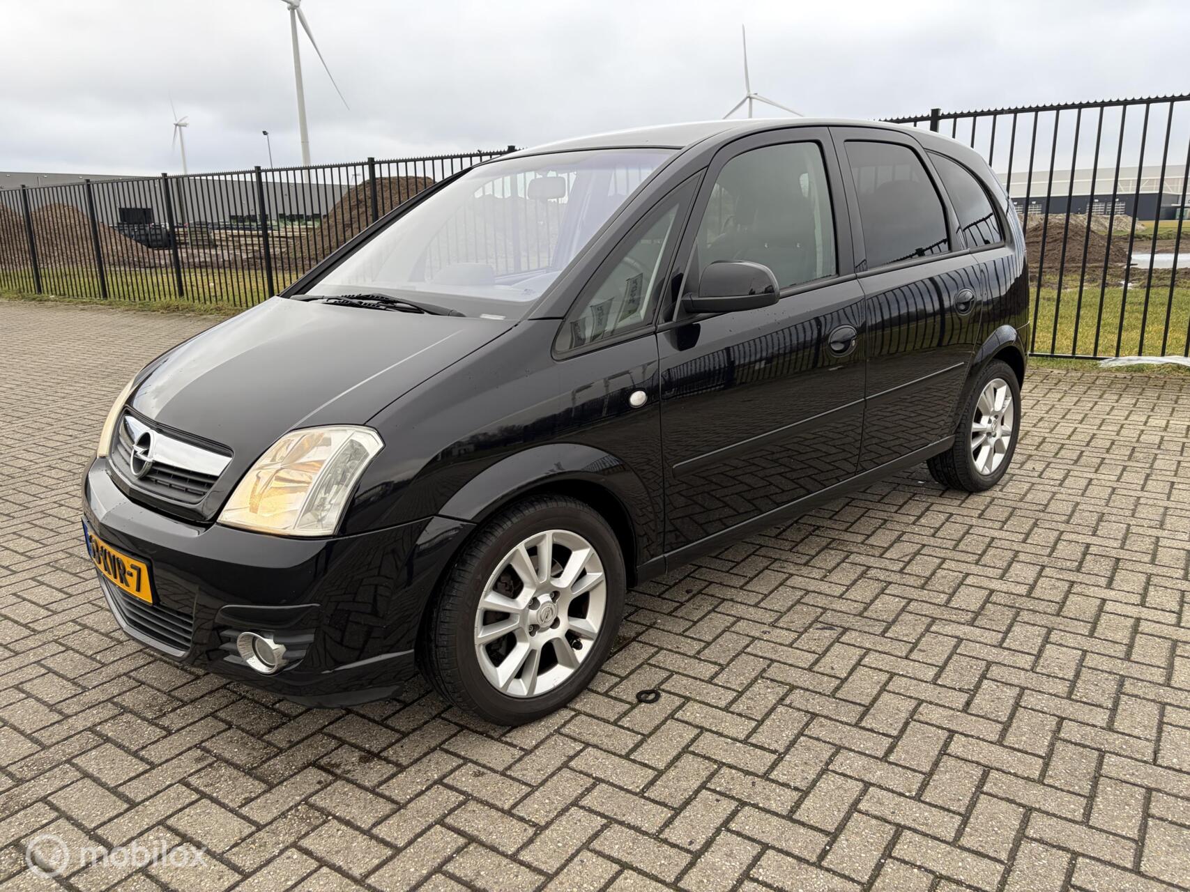 Opel Meriva-a 1.6-16V Cosmo 2010 - voorkant