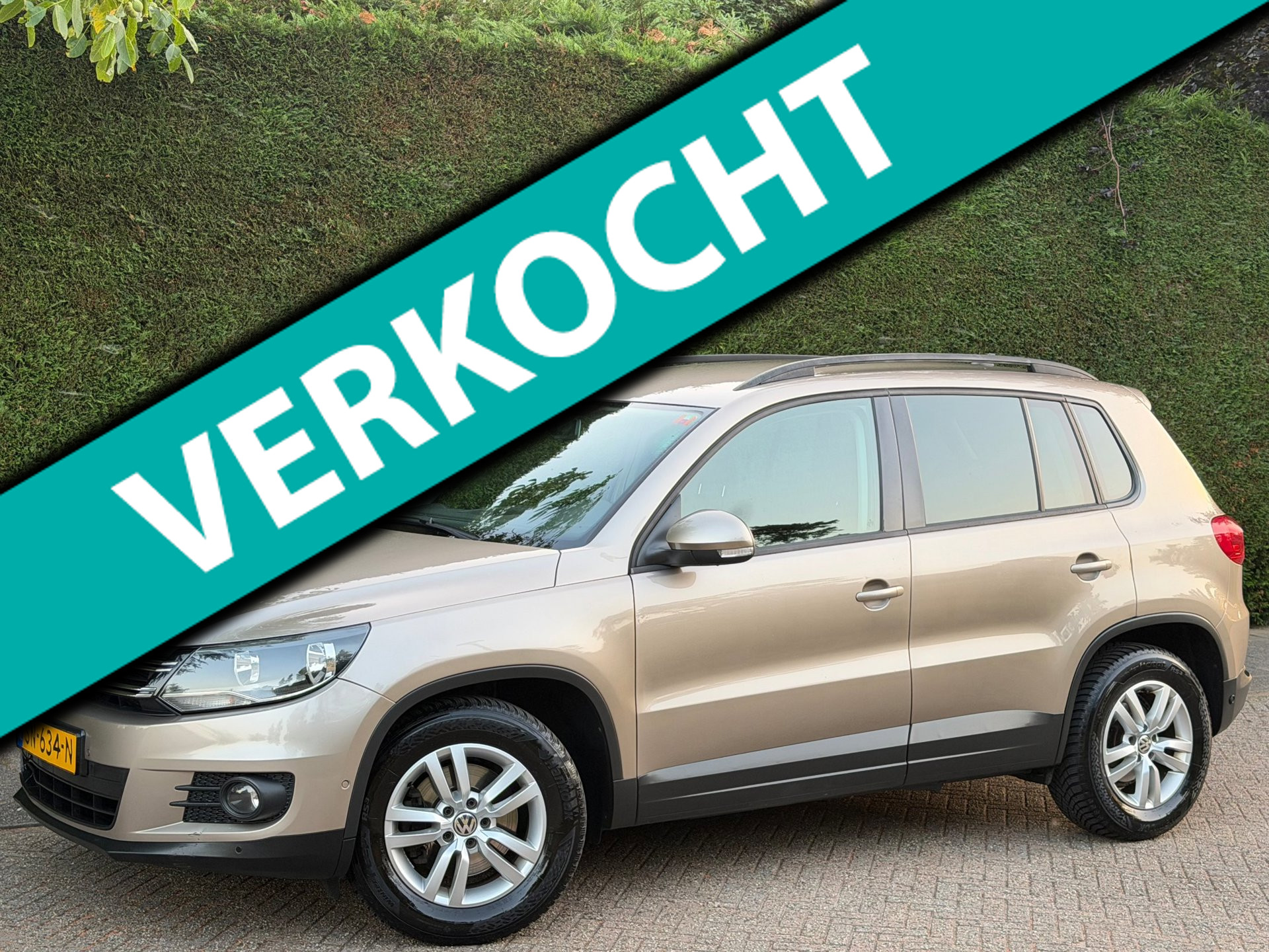 Volkswagen Tiguan 1.4 TSI  RIJDSUPER/AIRCO/6BAK/PDC V+A/SVRWN 2014 - voorkant