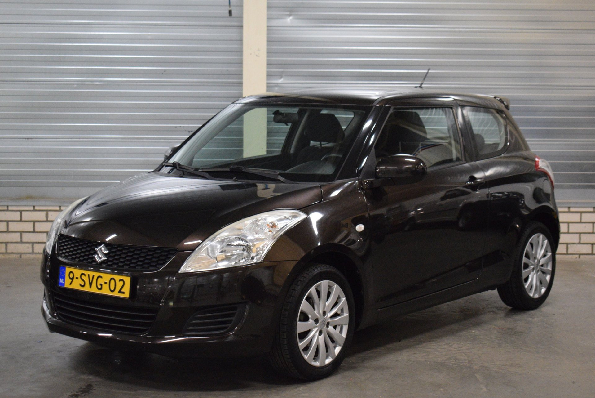 Suzuki Swift 1.2 Bandit EASSS + Airco|Stoelverwarming|Cruise Control|Trekhaak| 2013 - voorkant