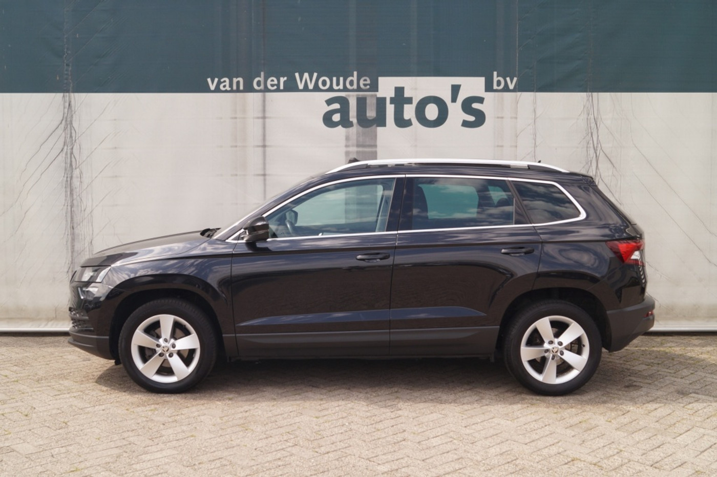 Skoda Karoq 1.0 TSI 115pk DSG Ambition Business -PANO-ECC-NAVI- 2020 - voorkant