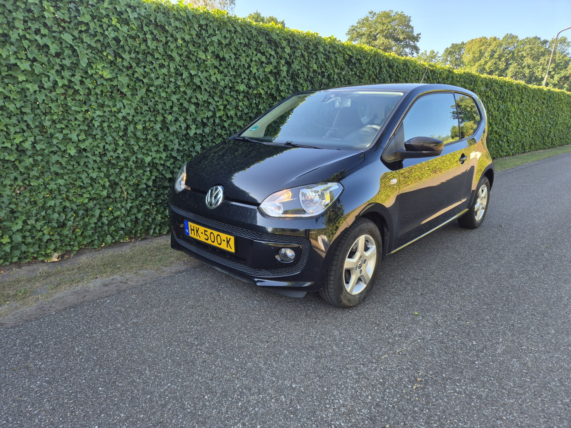 Volkswagen Up 1.0 move up! Cruise, airco, Parkeersensoren, Stoelverwarming 2011 - voorkant