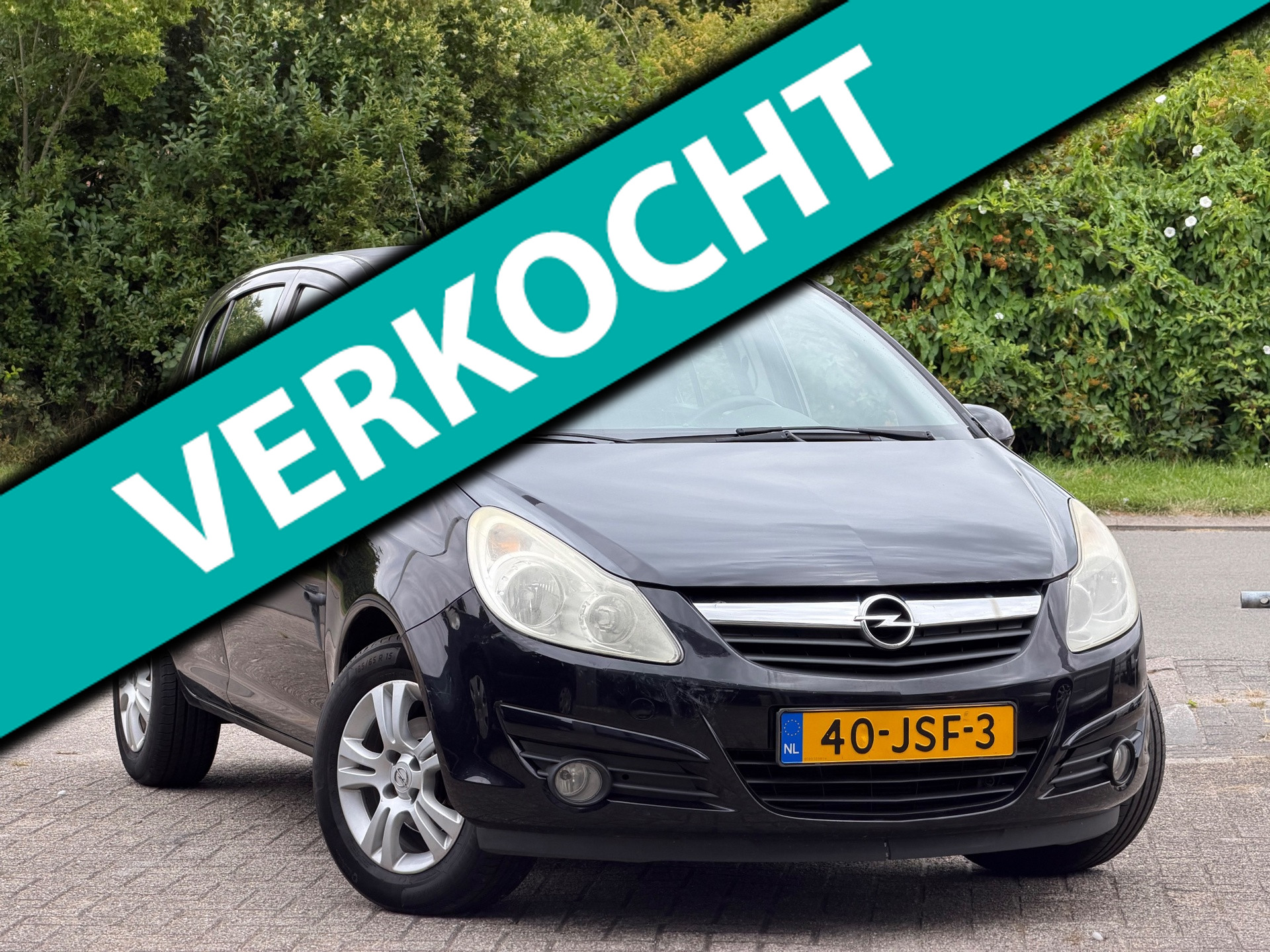 Opel Corsa 1.2 / NW APK / CRUISE / AIRCO 2009 - voorkant