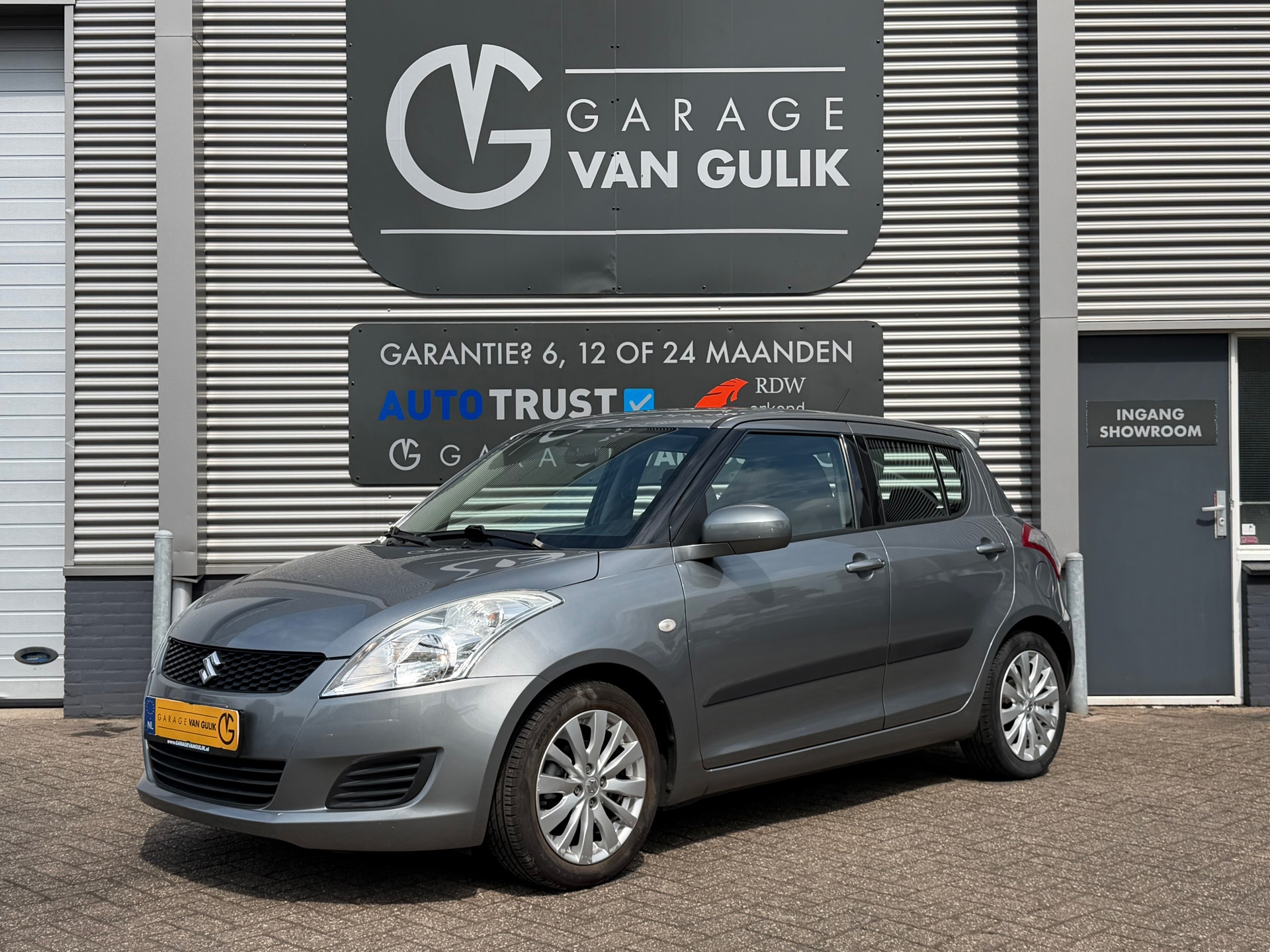 Suzuki Swift 1.2 94PK Bandit EASSS Airco,CruiseControl,Stoelverw.,Usb,Isofix,Radio/CdSpeler,Lmv,Elektr.Ramen,TweeSleutels,Onderh. 2013 - voorkant