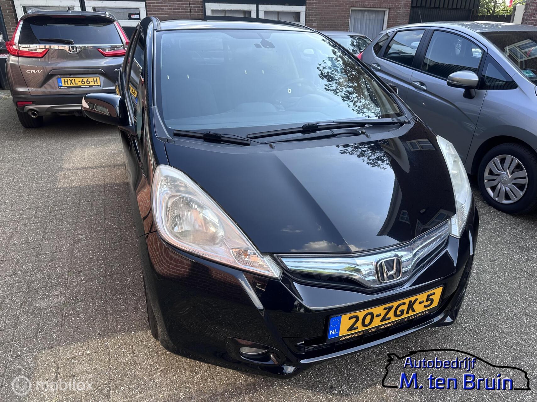 Honda Jazz Hybrid 1.4 Hybrid Elegance  Automaat+ parkeersensoren 2012 - voorkant