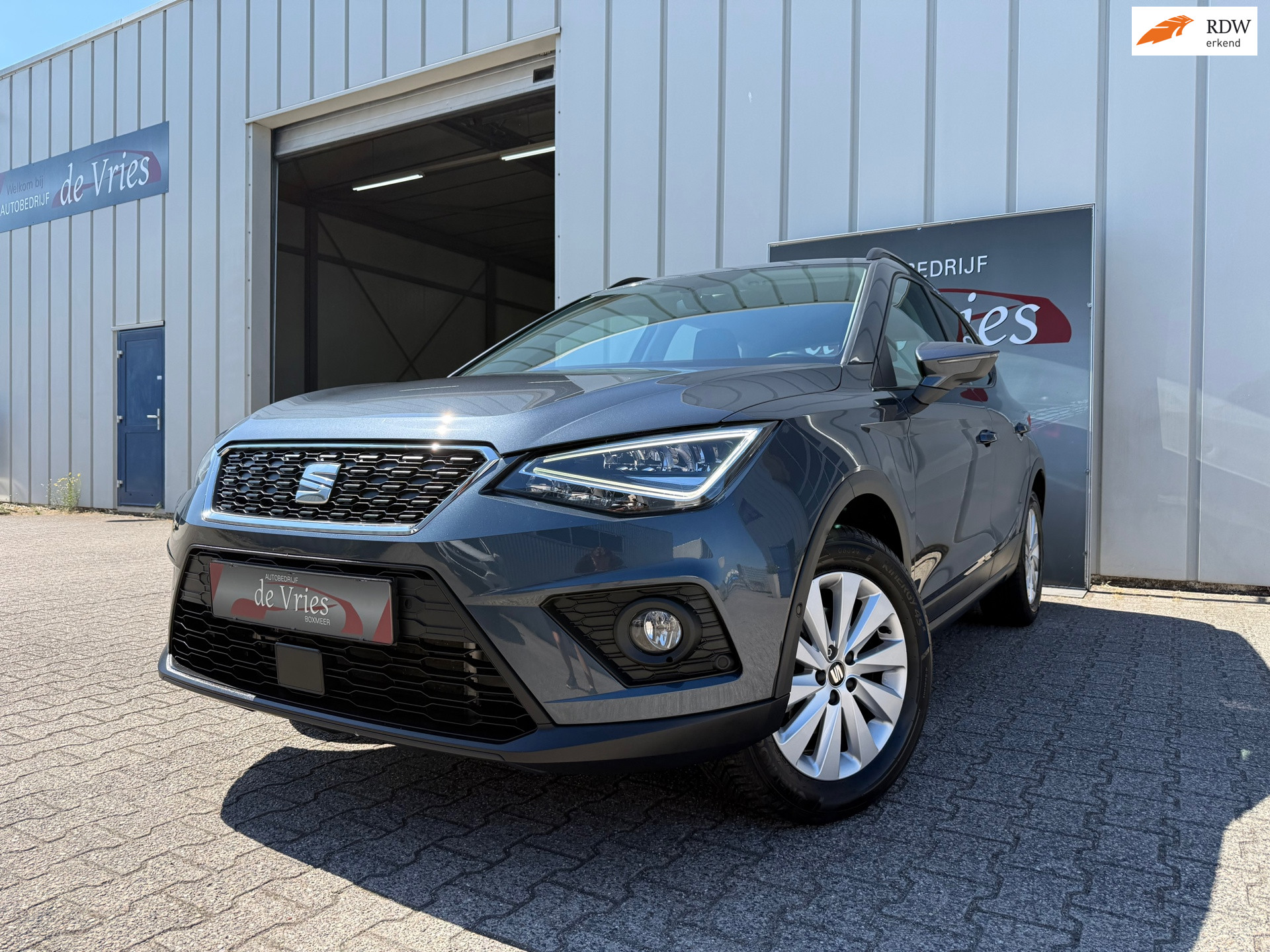 Seat Arona 1.0 TSI Style / Airco / Navi / Cruise control / Stoelverw. / Apple Carplay / 2021 - voorkant