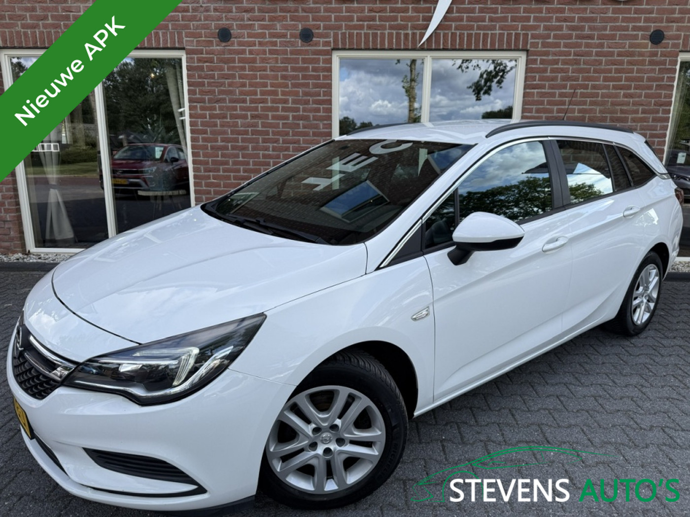 Opel Astra Sports Tourer 1.0 T. Business 105PK NAVI / AIRCO / CRUISE / PDC / ISOFIX 2019 - voorkant