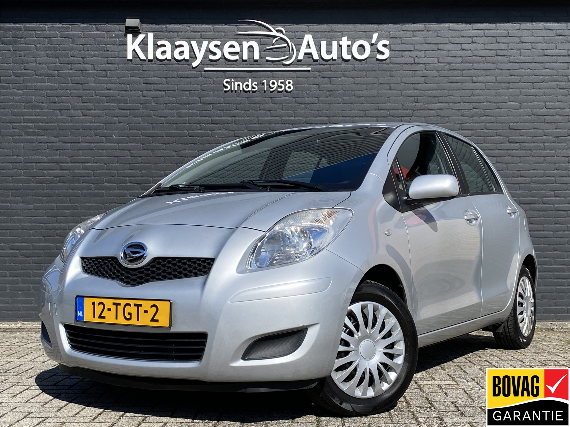 Toyota Daihatsu Charade 1.3 City AUT. | dealer onderhouden | airco | trekhaak | parkeersensoren | schuifbank | elektrisch pakket 2012 - voorkant
