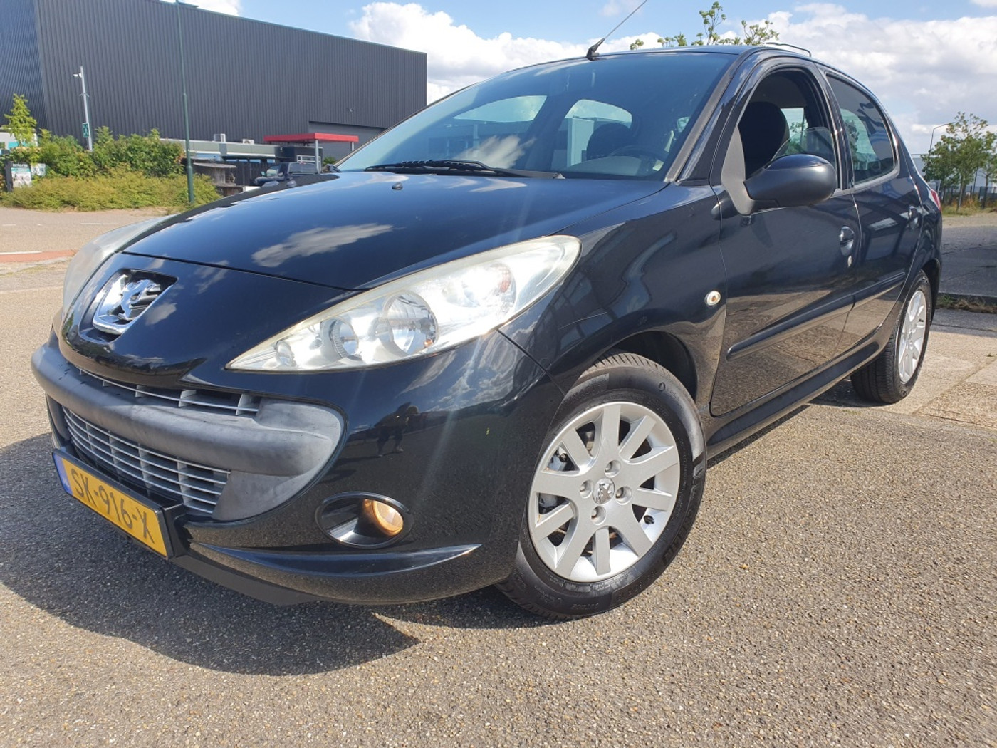 Peugeot 2***** 1.4 XS 5-DRS AIRCO|APK|NAP|2009 2009 - voorkant