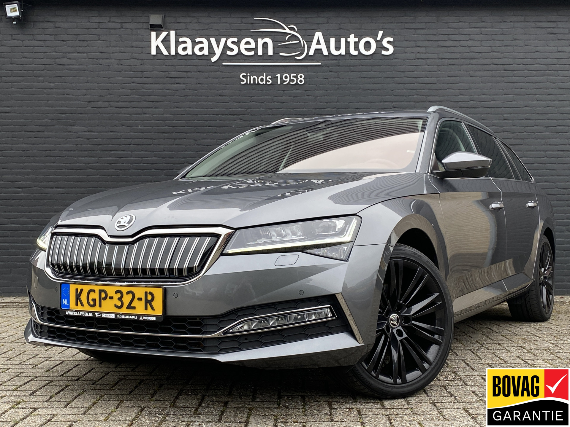 Škoda Superb Combi 1.4 TSI iV 218 pk Business Edition Plus AUT. | 1e eigenaar | navigatie | panoramadak | trekhaak | leder interieur 2022 - voorkant