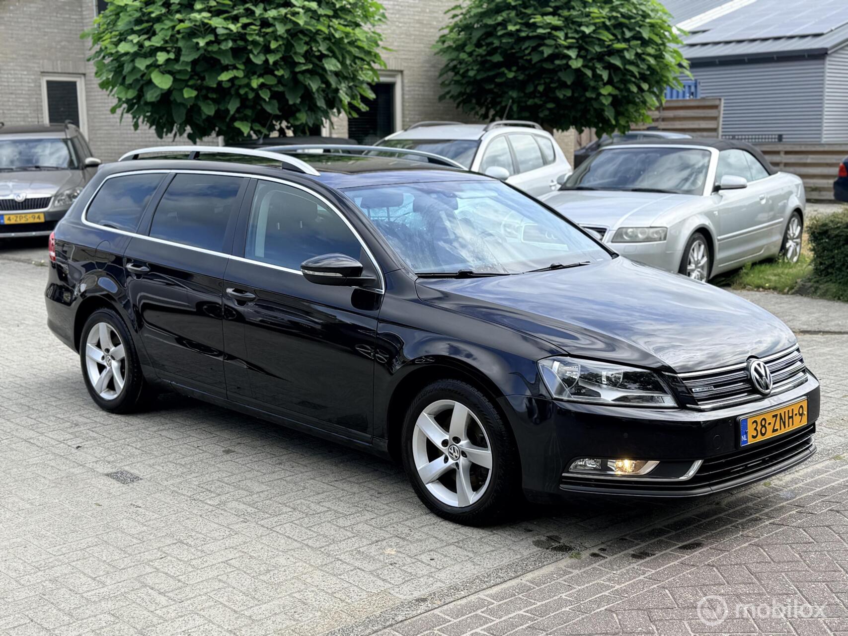 Volkswagen Passat 1.6 TDI Trendline BlueMotion 2012 - voorkant