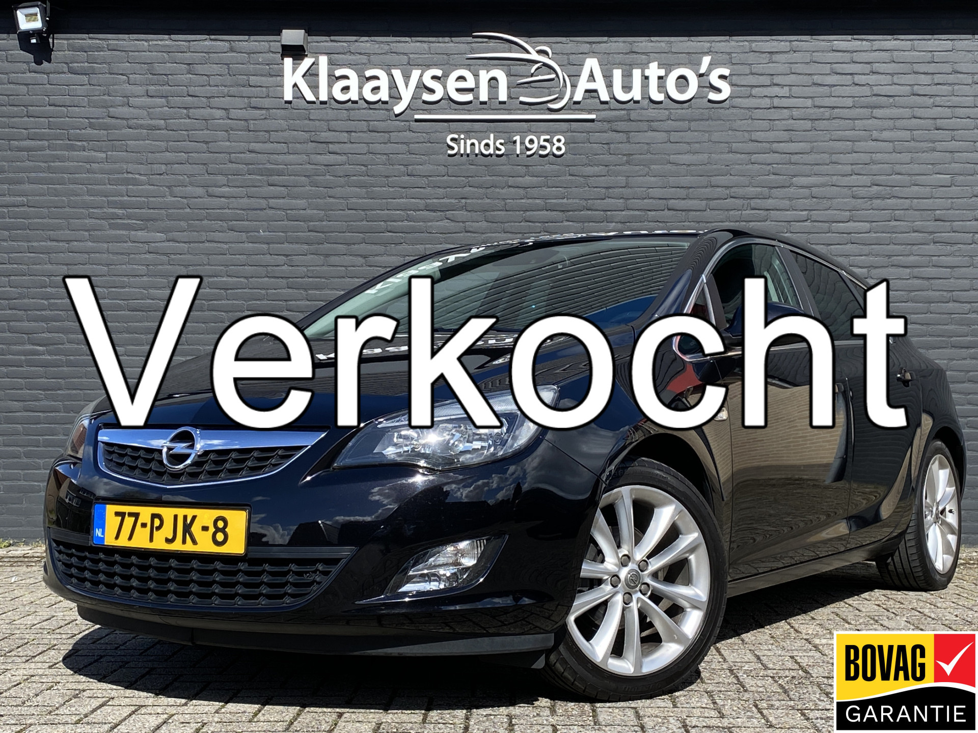 Opel Astra 1.4 Turbo Sport | leder interieur | sportstoelen | airco | trekhaak | stoelverwarming | cruise control 2011 - voorkant
