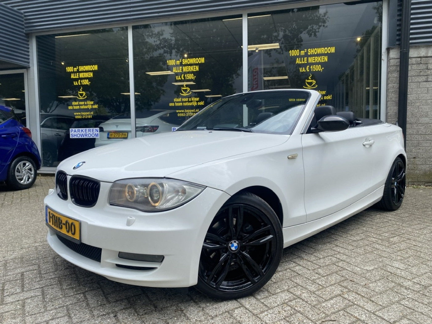 BMW 1er Reihe 118d High Executive supernette auto. 2009 - voorkant