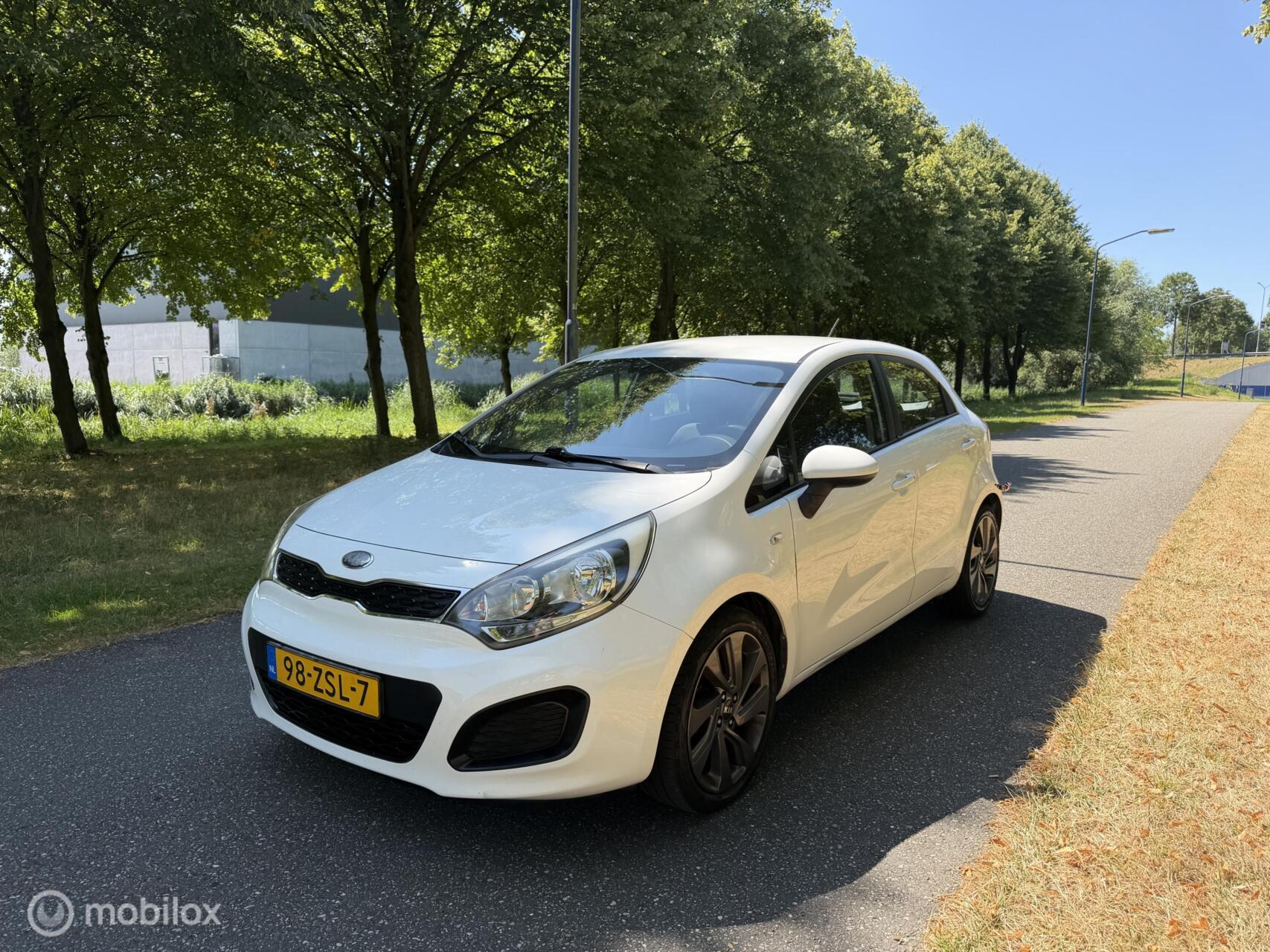 Kia Rio 1.2 CVVT Comfort Pack*AIRCO*CRUISE*ELEK. RAMEN 2013 - voorkant