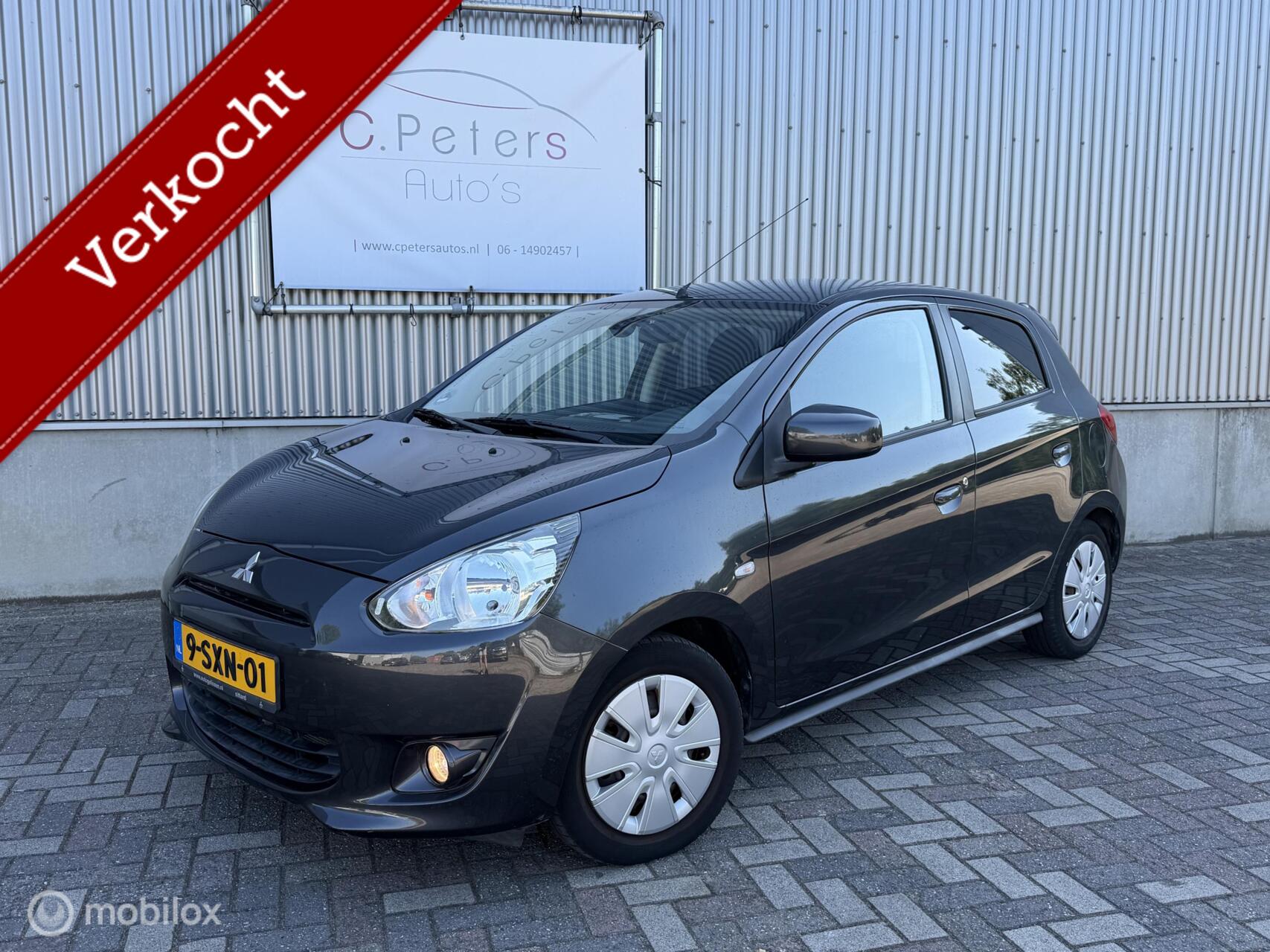 Mitsubishi Mitsubishi Space Star 1.2 80pk Invite 2014 5deurs / Airco / 86.000km NAP 2014 - voorkant