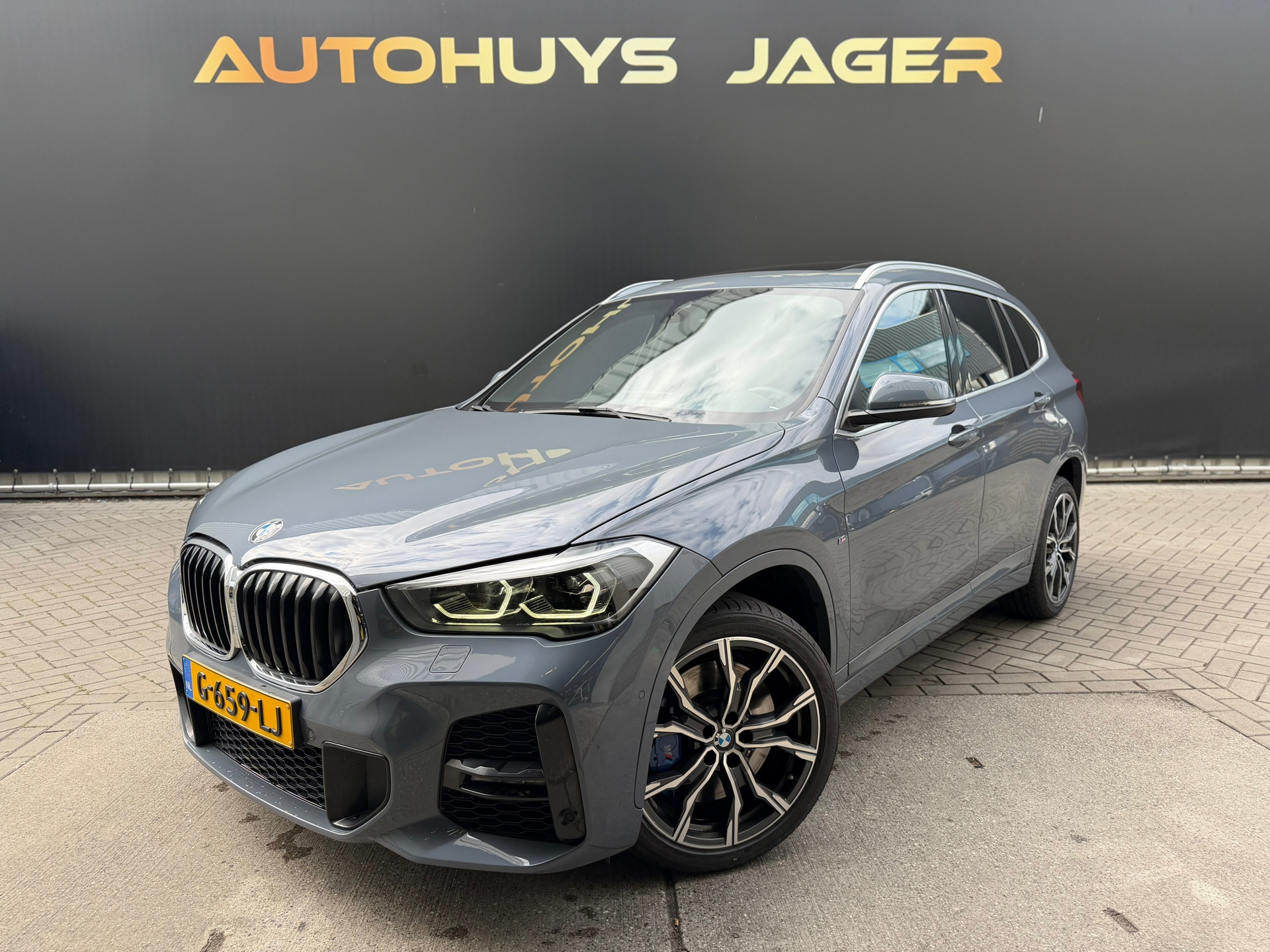 BMW X1 Sdrive20i SDrive20i High Executive Edition Pano Memory Hud h&k Leder Camera 2019 - voorkant
