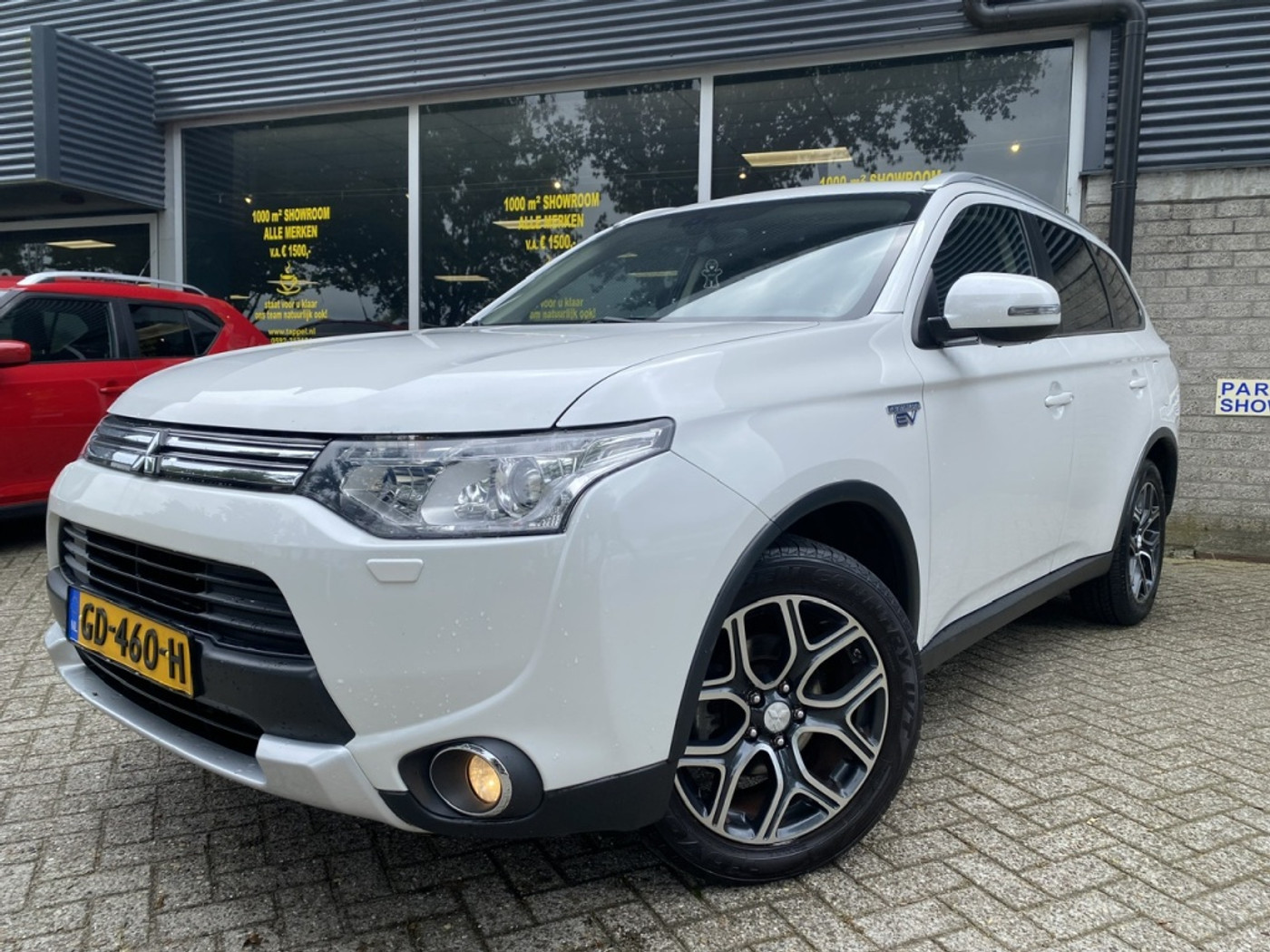 Mitsubishi Mitsubishi Outlander 2.0 PHEV Executive Edition XLine Camera/Trekhaak/Rocksford audio 2015 - voorkant