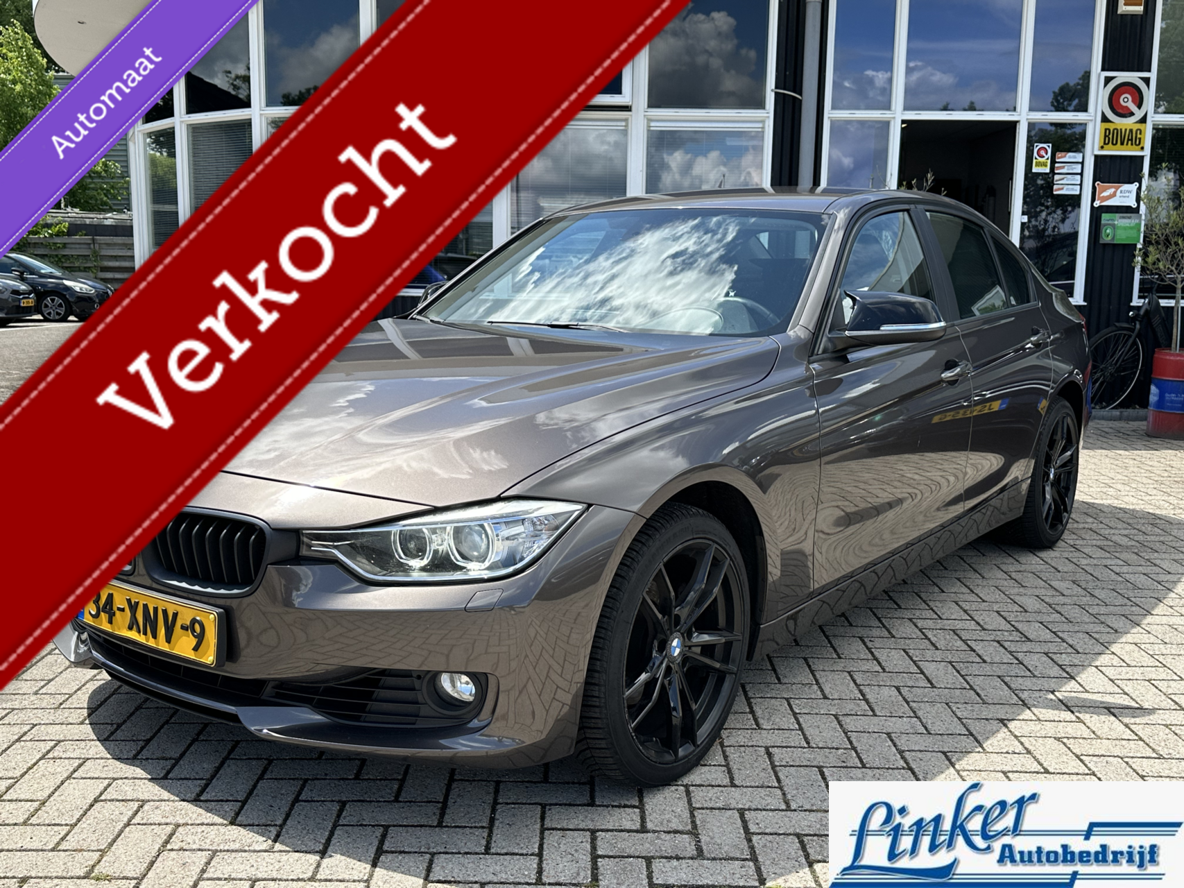 BMW 3er Reihe 320i High Executive - NL-AUTO AUTOMAAT PDC ACHTER 2012 - voorkant