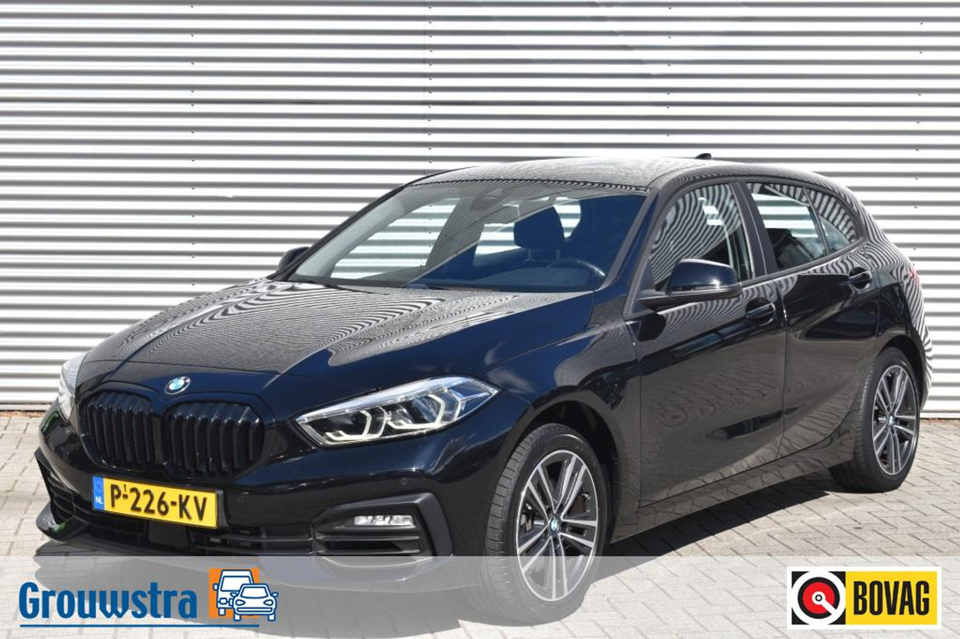 BMW 116i 116I BUSINESS EDITION / AUTOMAAT /  17 LMV / NAVI / CLIMA / 2022 - voorkant