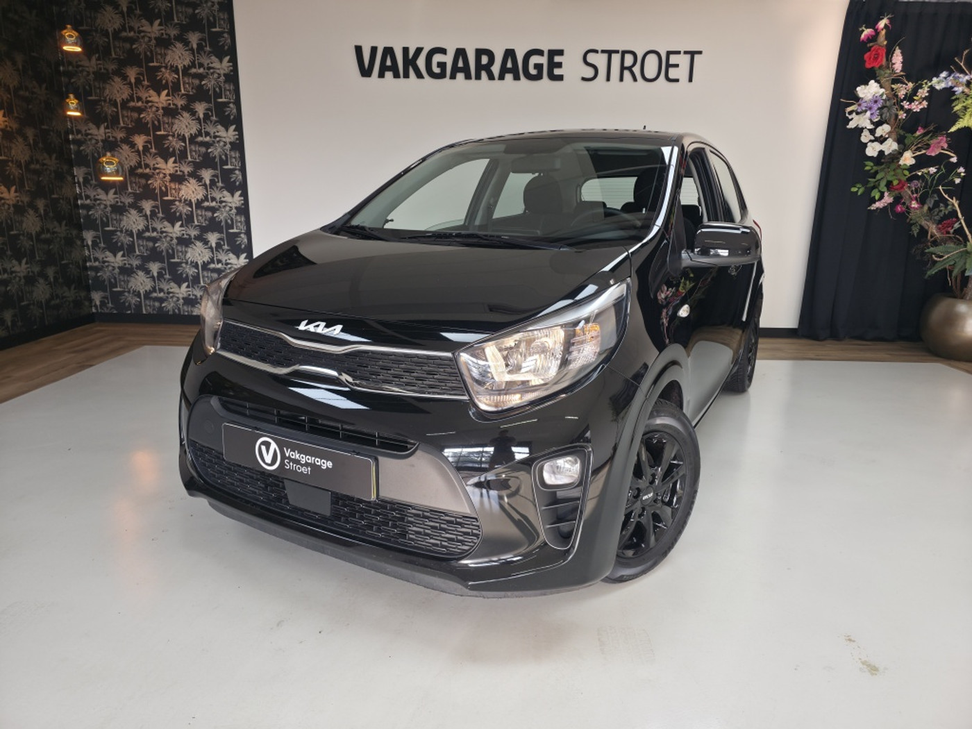 Kia Picanto 1.0 DPi Comf.L | cruise | ac | zwart LMV | BT | oh.bkje | NL | jaarbeurt 2022 - voorkant