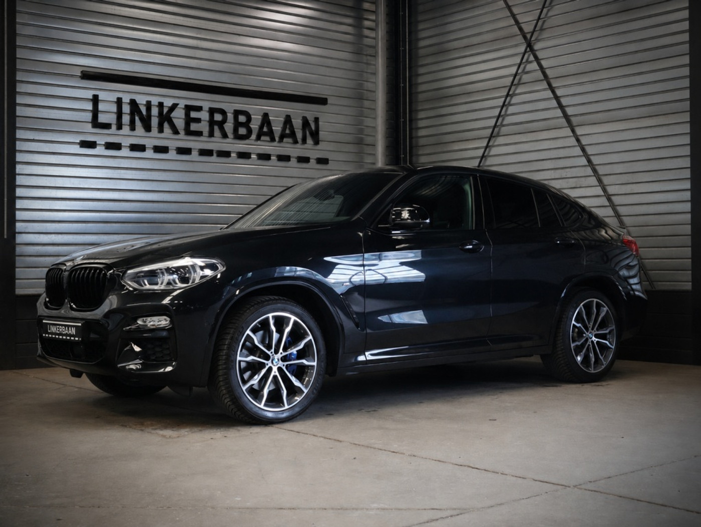 BMW X4 M40i High Executive | Panodak | H&K | Trekhaak | Driving Assistant Plus | 20 inch | 2019 - voorkant