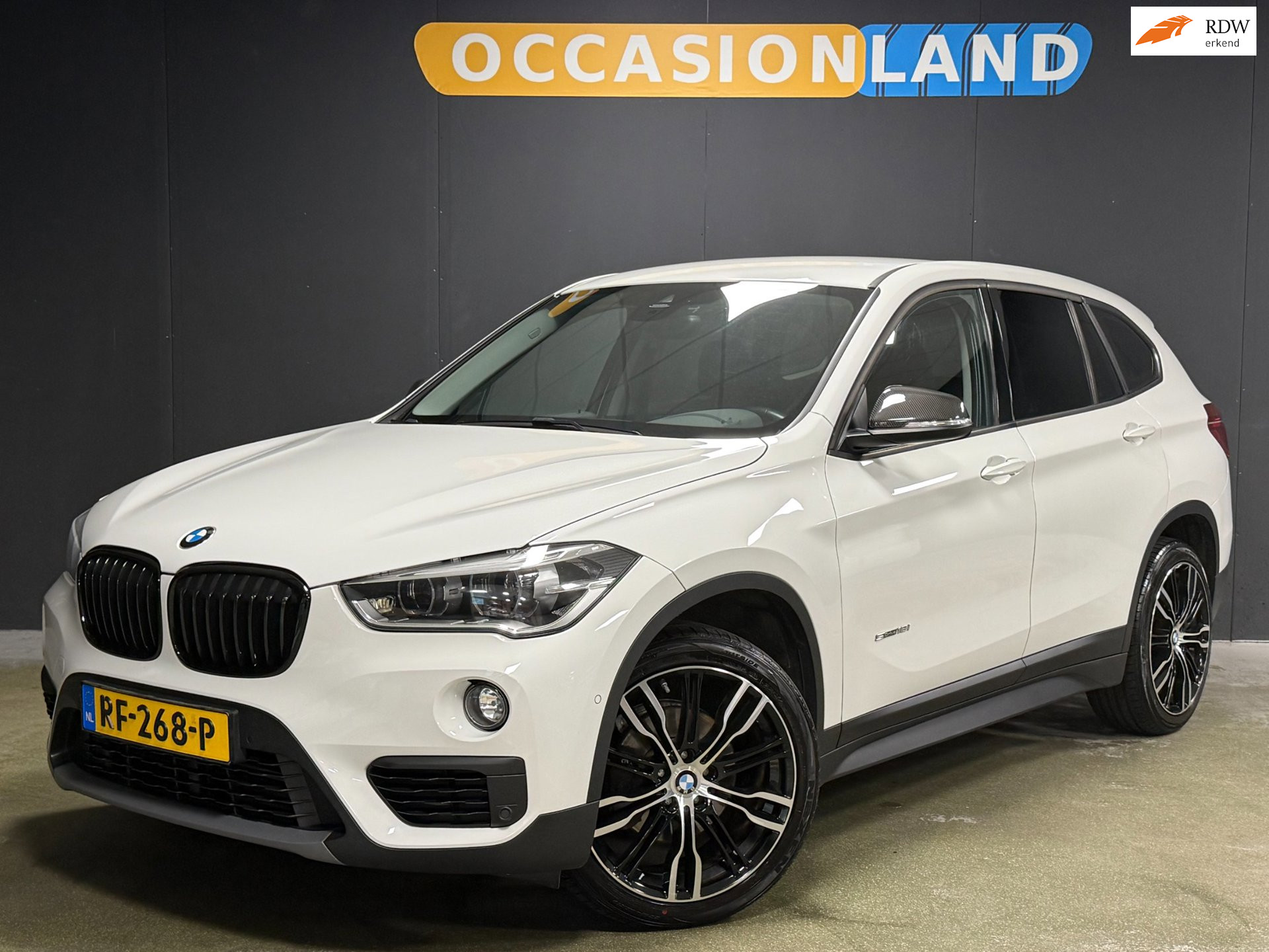 BMW X1 Sdrive18i SDrive18i Centennial High Executive|LED|CRUISE|STOELV|BLUETOOTH|NAVIGATIE|19INCH| 2017 - voorkant