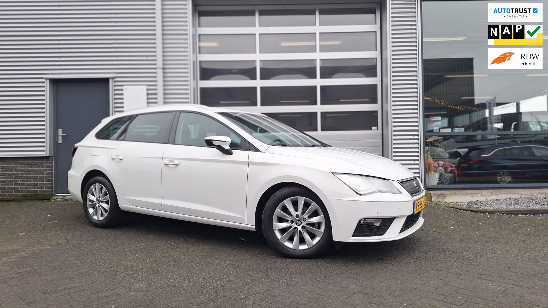 Seat Leon ST 1.0 EcoTSI Style Business Intense/Navigatie/Pdc V/A/Lm Velgen/50 Dkm 2018 - voorkant