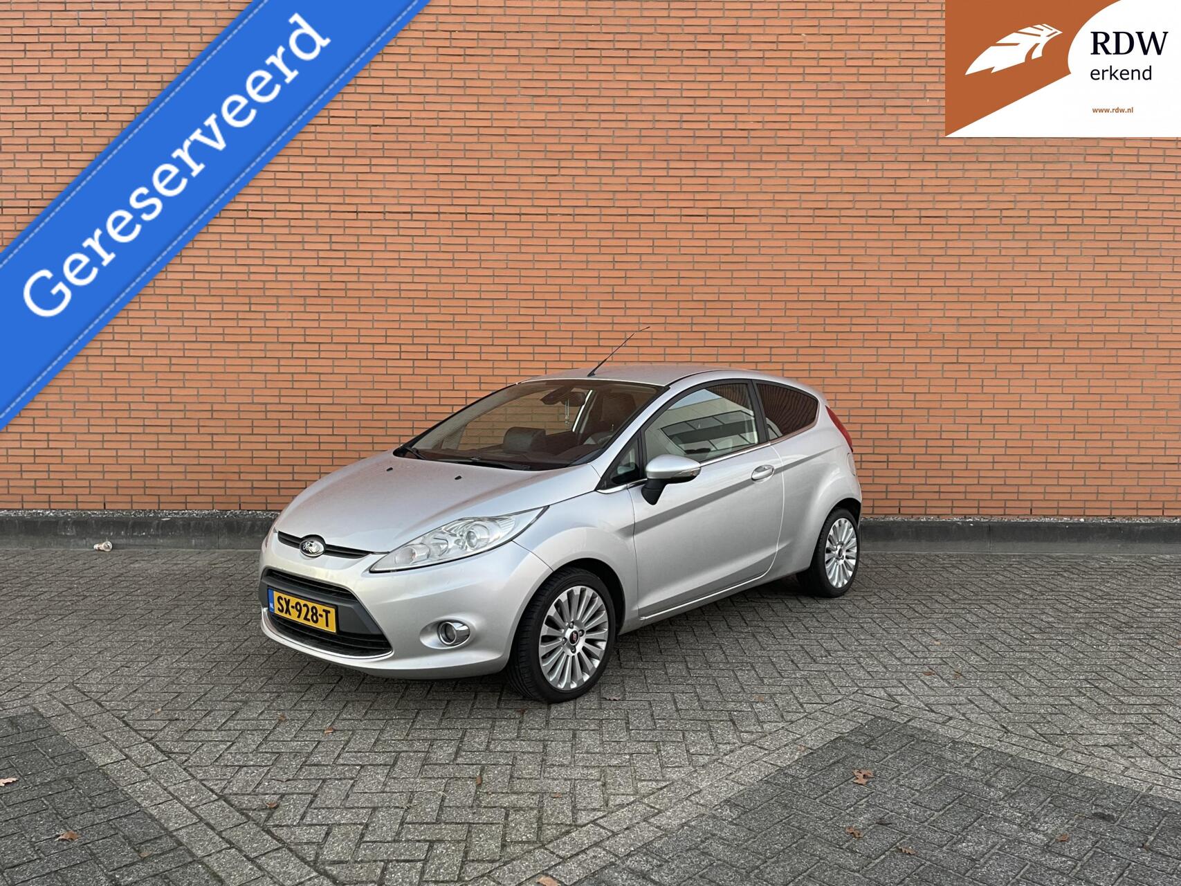 Ford Fiesta 1.4 Ghia AIRCO | LEER | STOELVRWNG | NAVI | APK 2009 - voorkant