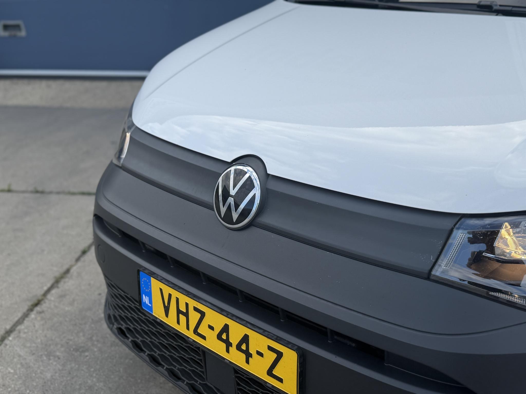 Foto van Volkswagen Caddy Modified Partition Wall