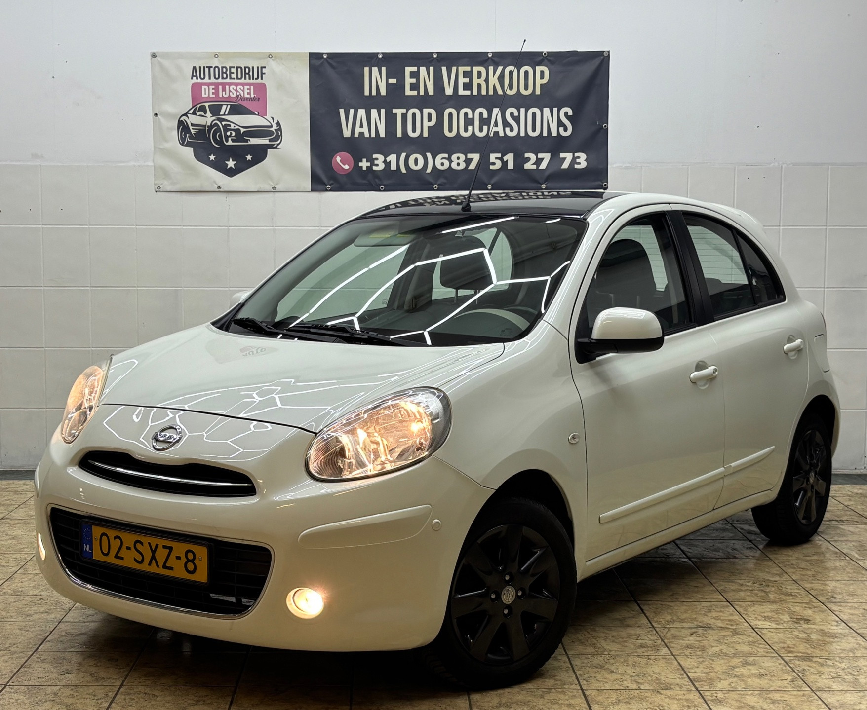 Nissan Nissan Micra 1.2 DIG-S Tekna/ VOL OPTIES / 2DE EIG / TOP STAAT 2012 - voorkant