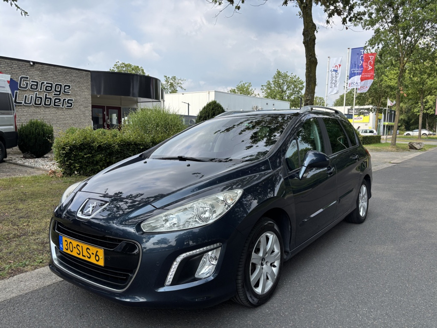 Peugeot 308 1.6 VTi Première 2011 - voorkant