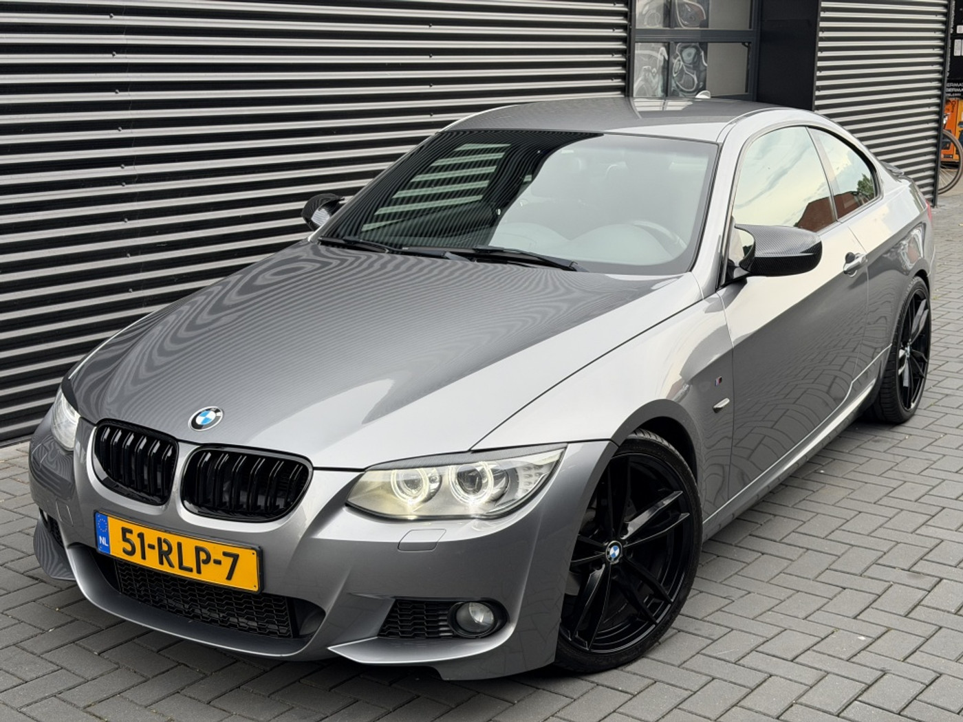 BMW 320i 320i Corp.L. BnsL.S| M-PAKKET| AUTOMAAT| 19"| NAVI| CLIMA 2011 - voorkant