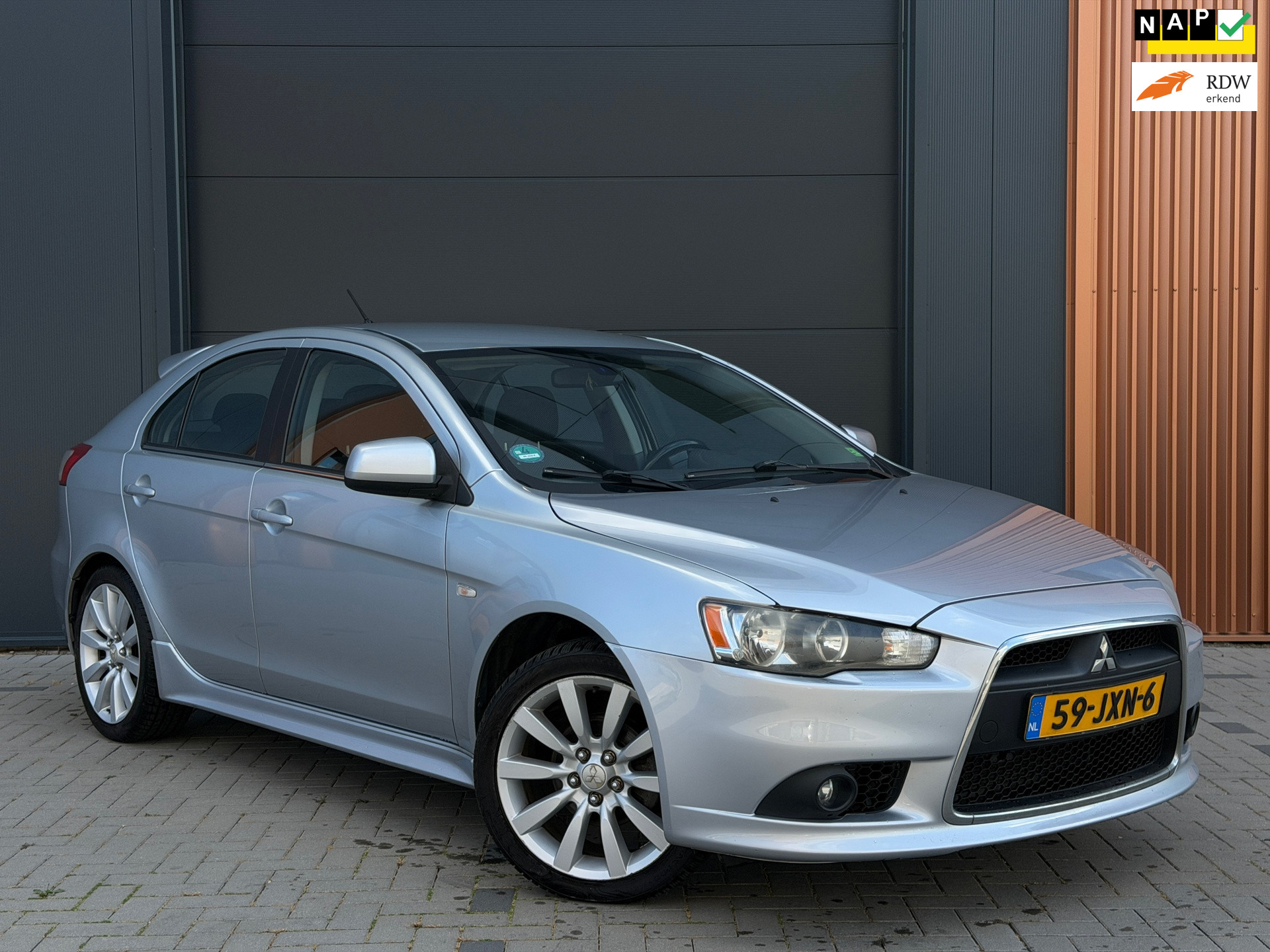 Mitsubishi Mitsubishi Lancer 1.8 Intense|Trekhaak|Cruise Control|Airco|Parkeersensoren|Subwoofer|Nette Auto 2009 - voorkant