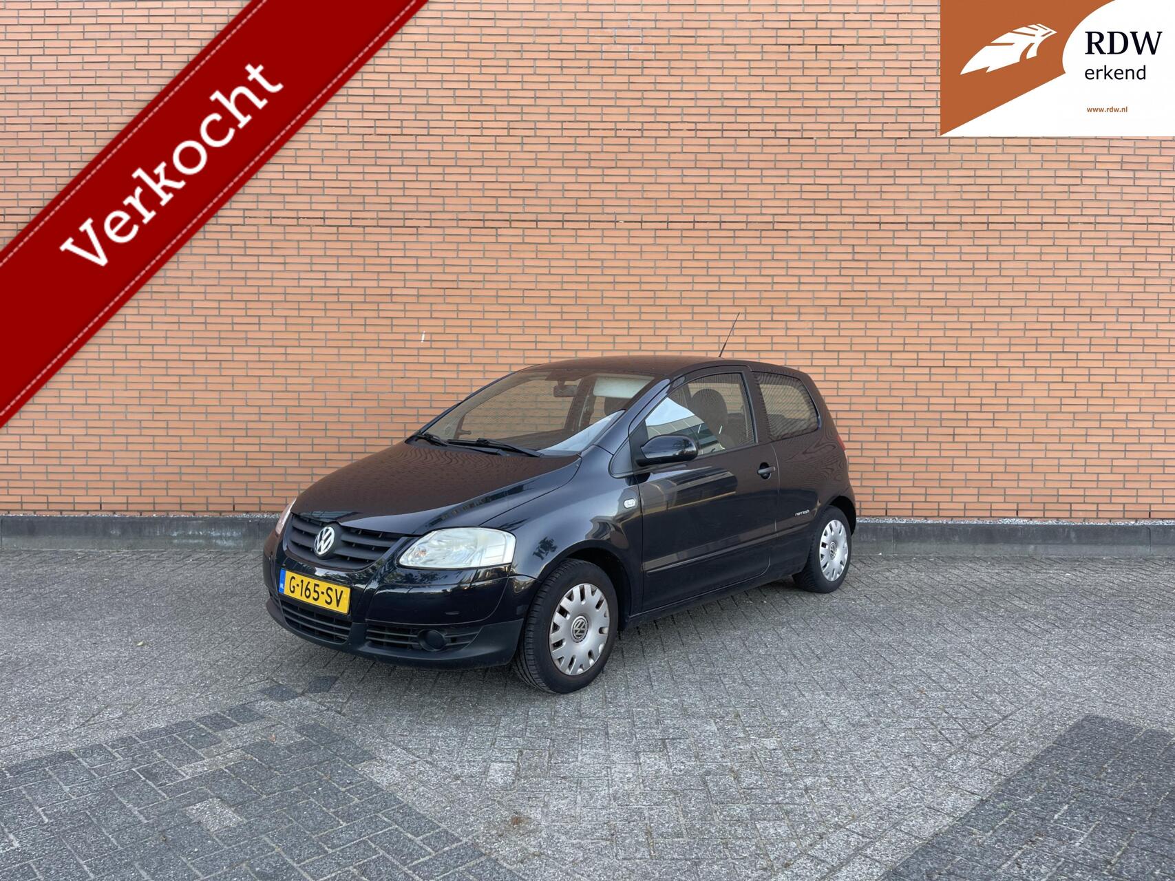 Volkswagen Fox 1.2 2010 | INRUIL | ZWART | 203DKM | APK | 2010 - voorkant