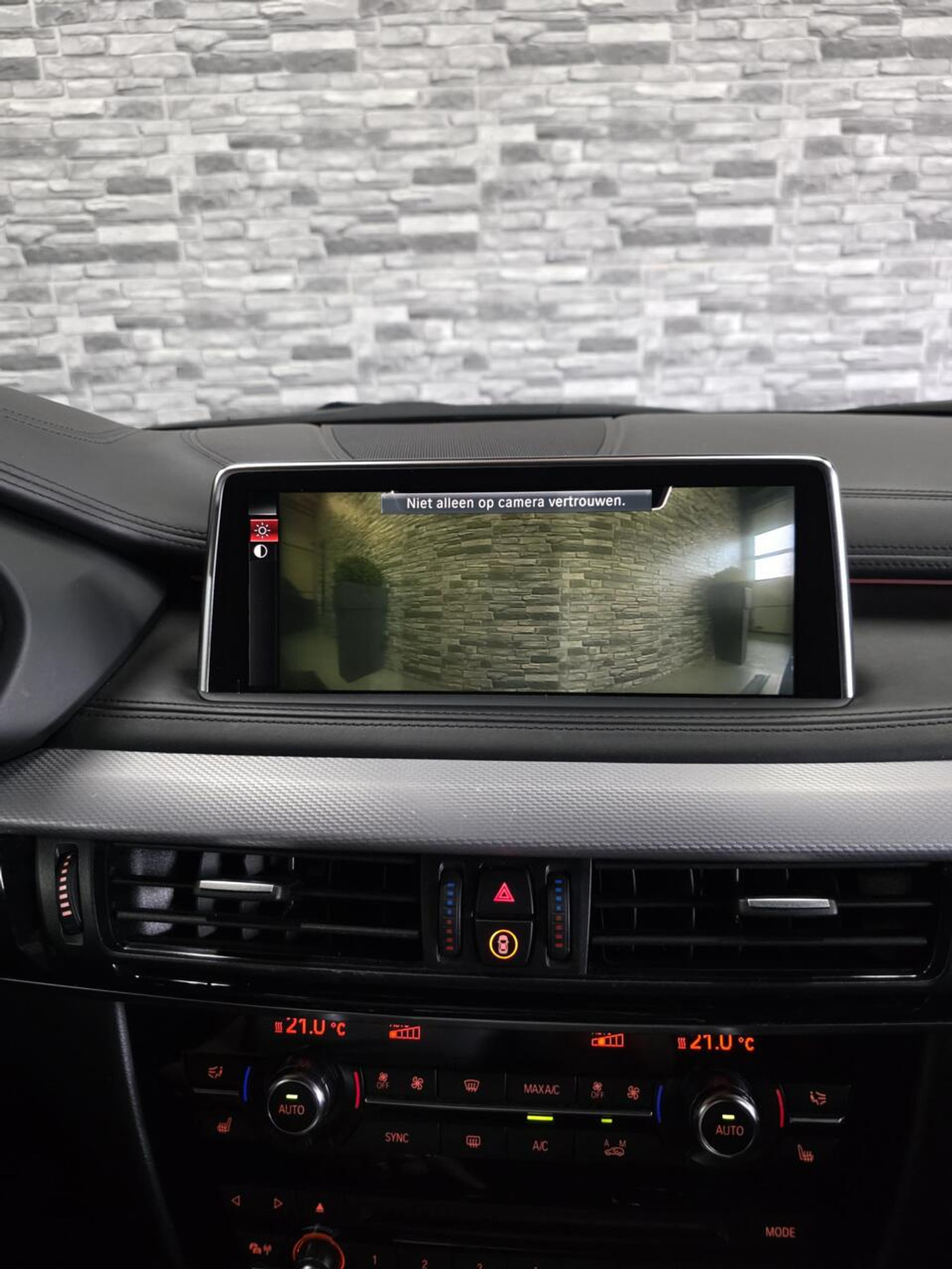 Foto van BMW X6 M50d