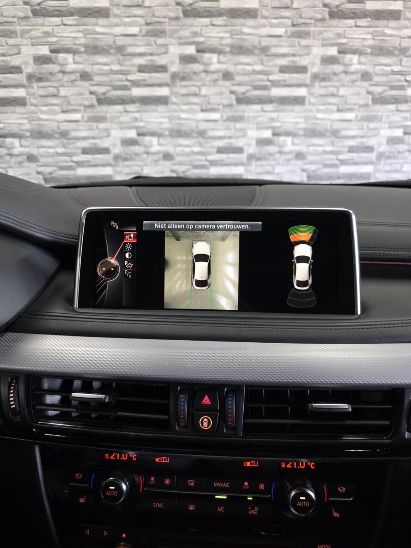 Foto van BMW X6 M50d