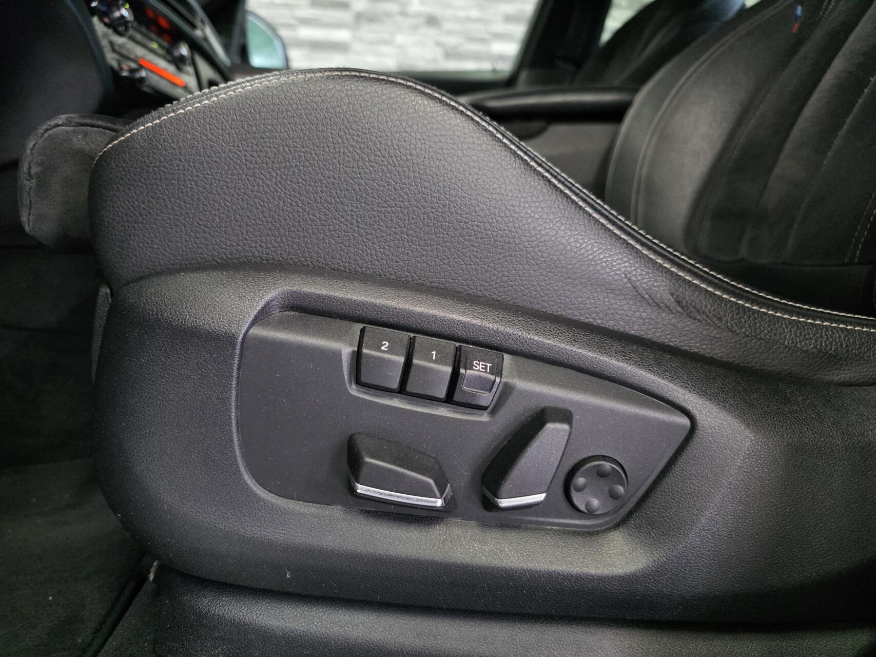 Foto van BMW X6 M50d