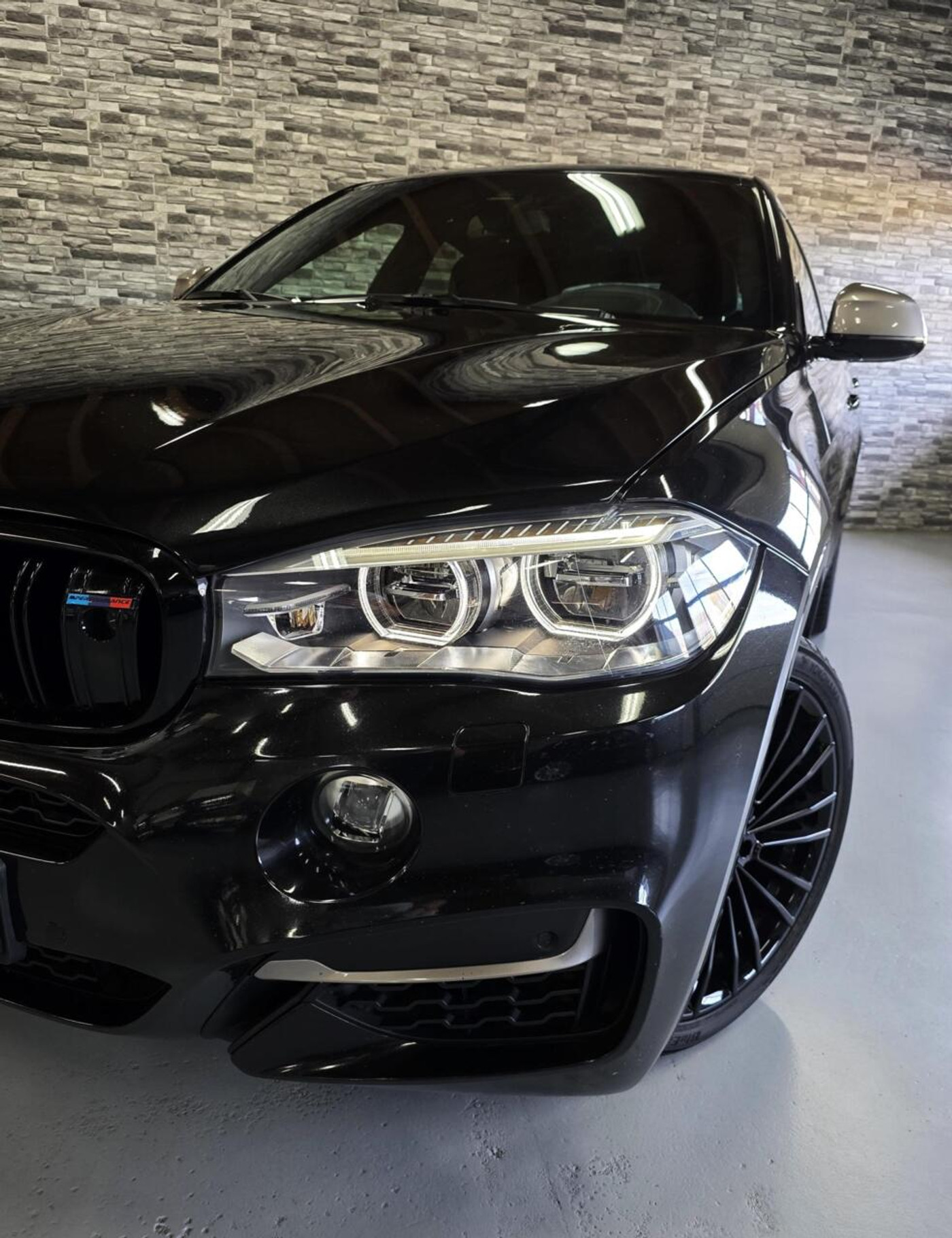 Foto van BMW X6 M50d