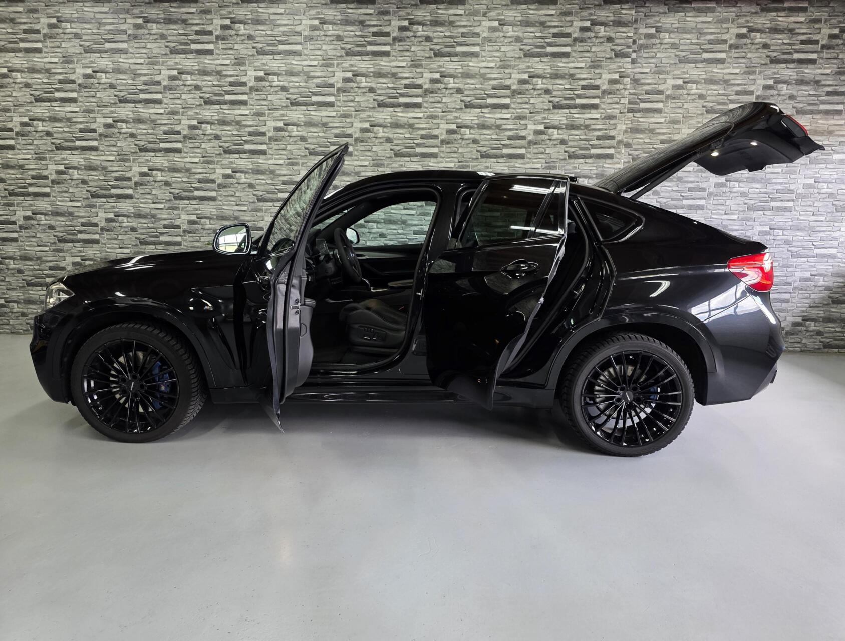 Foto van BMW X6 M50d