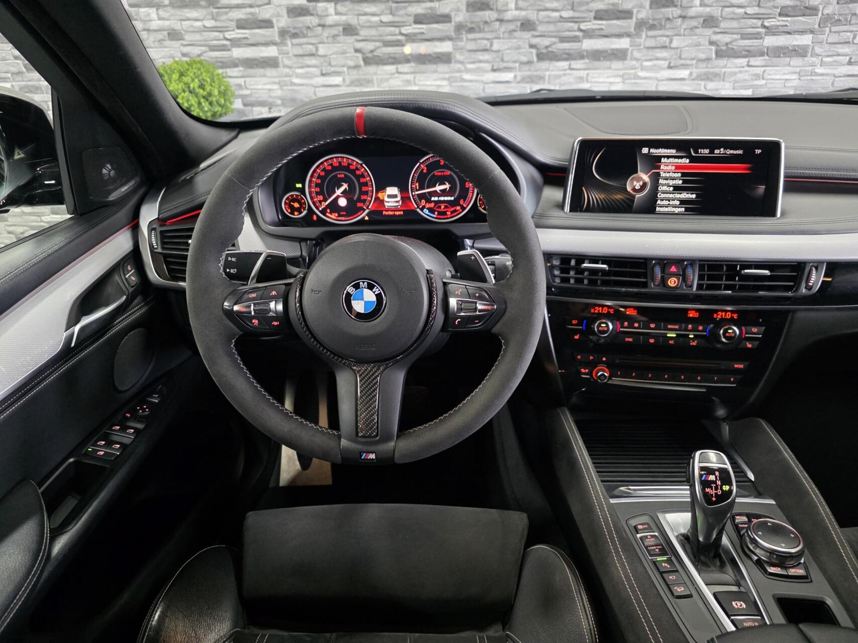 Foto van BMW X6 M50d