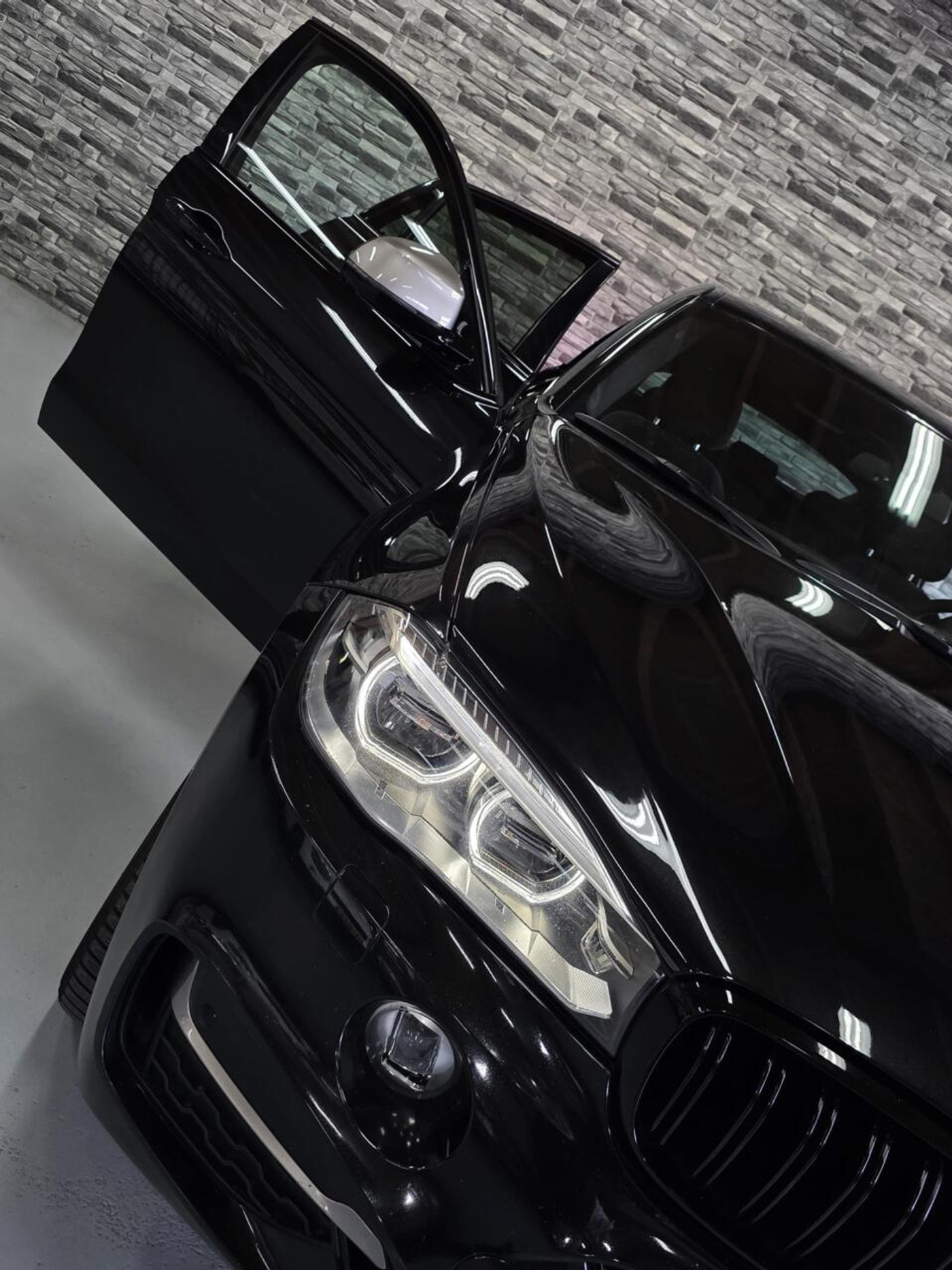 Foto van BMW X6 M50d